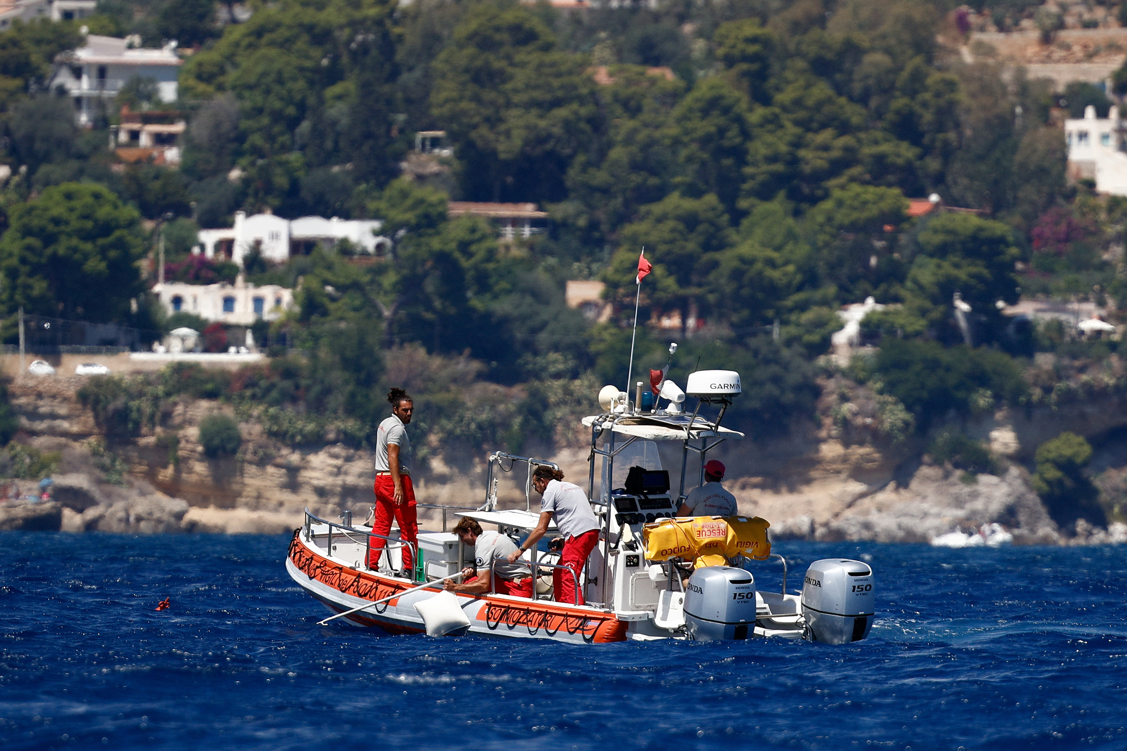 Rescue operations continue after a luxury yacht sank off Sicily