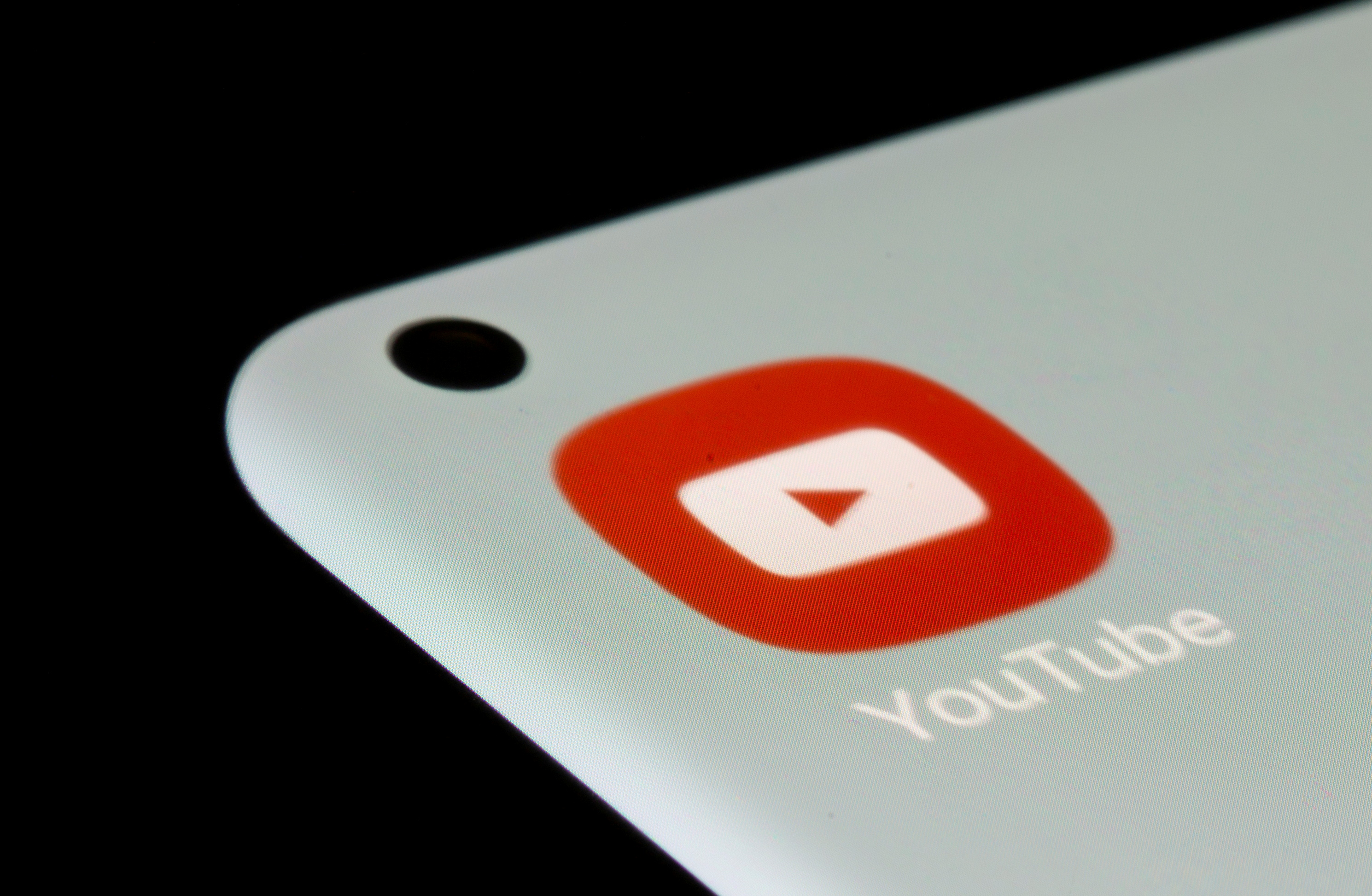 YouTube blocks Russian state-funded media channels globally | Reuters