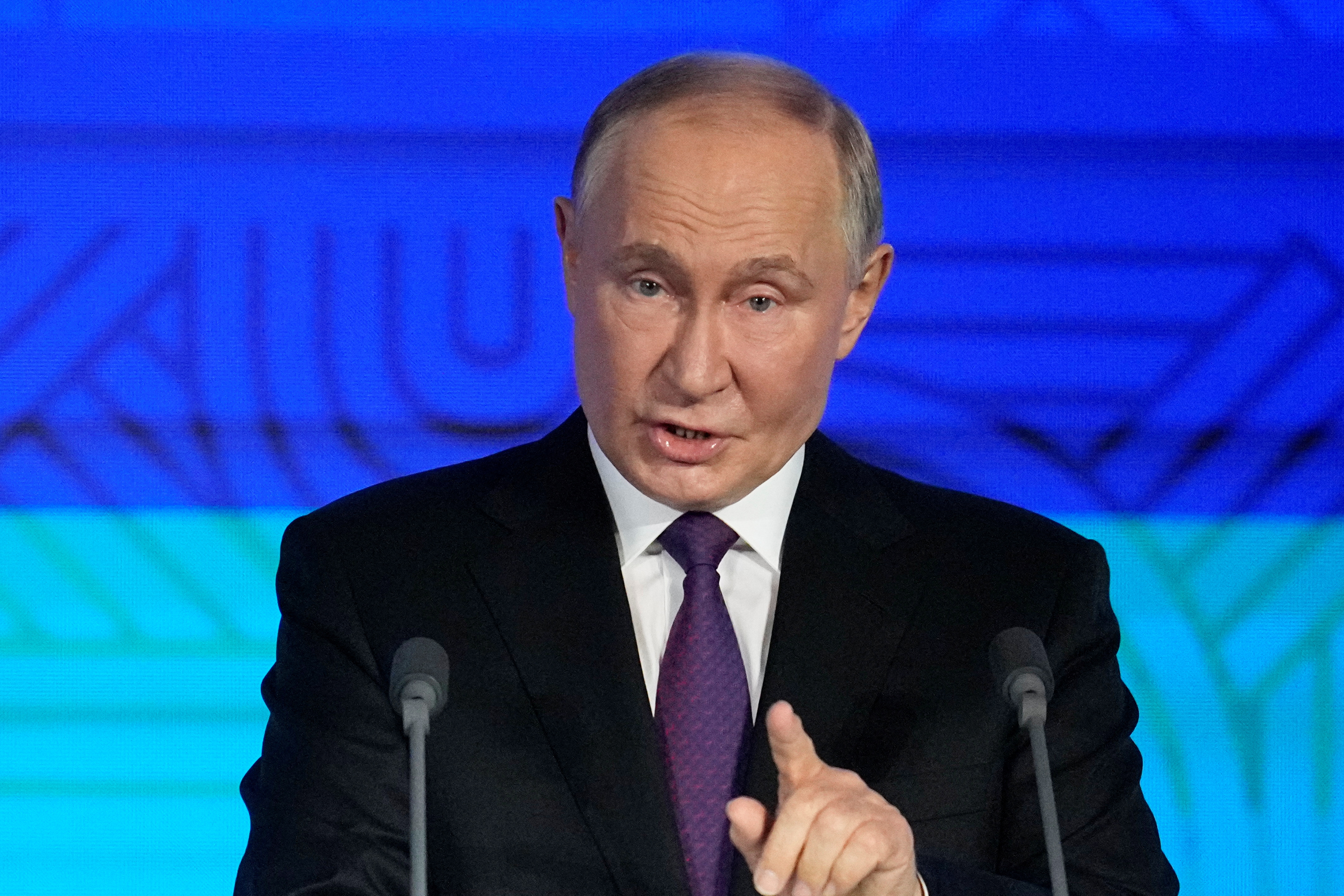 Russian President Vladimir Putin attends the BRICS Business Forum in Moscow