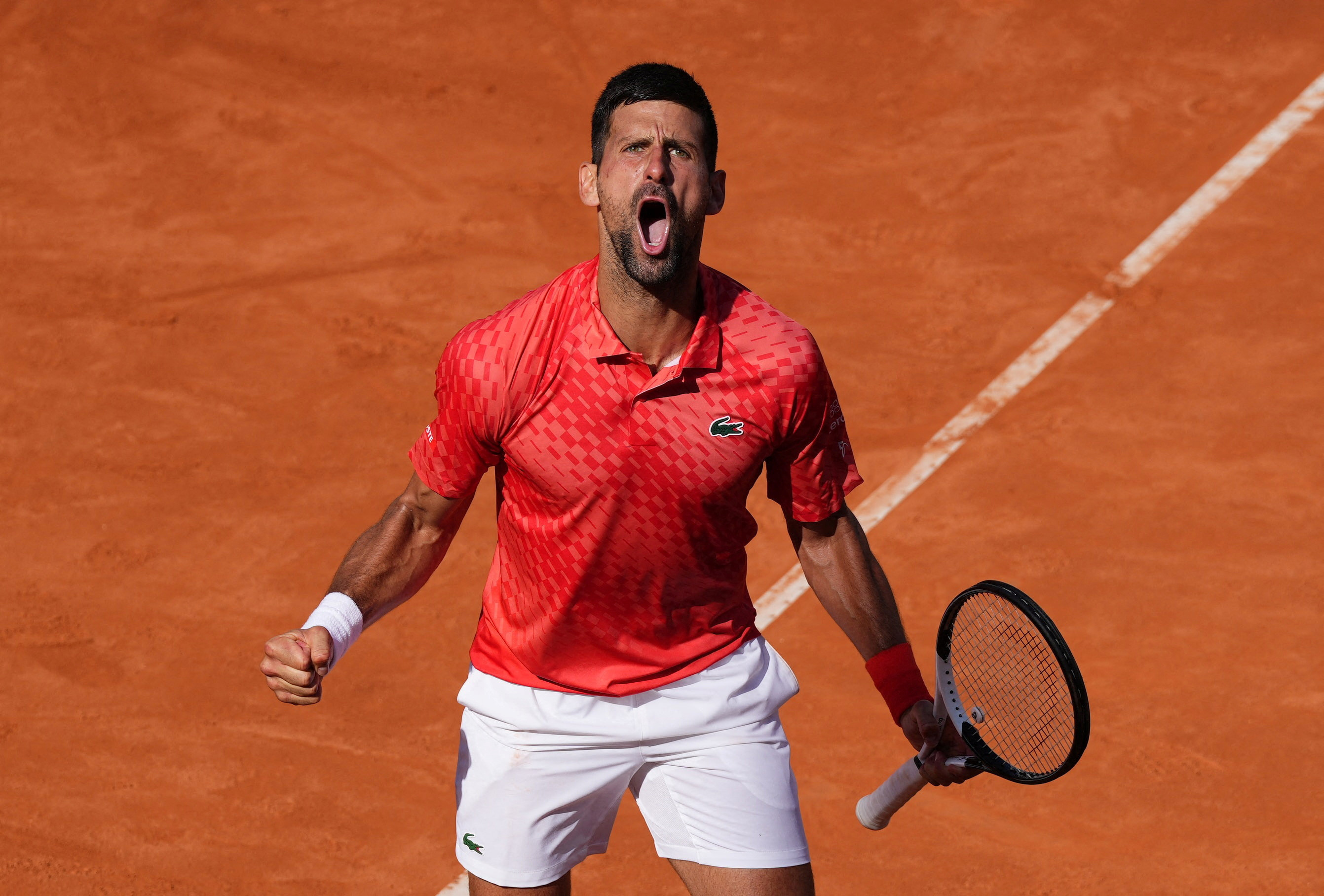 Djokovic battles past Dimitrov in Rome, Swiatek cruises Reuters