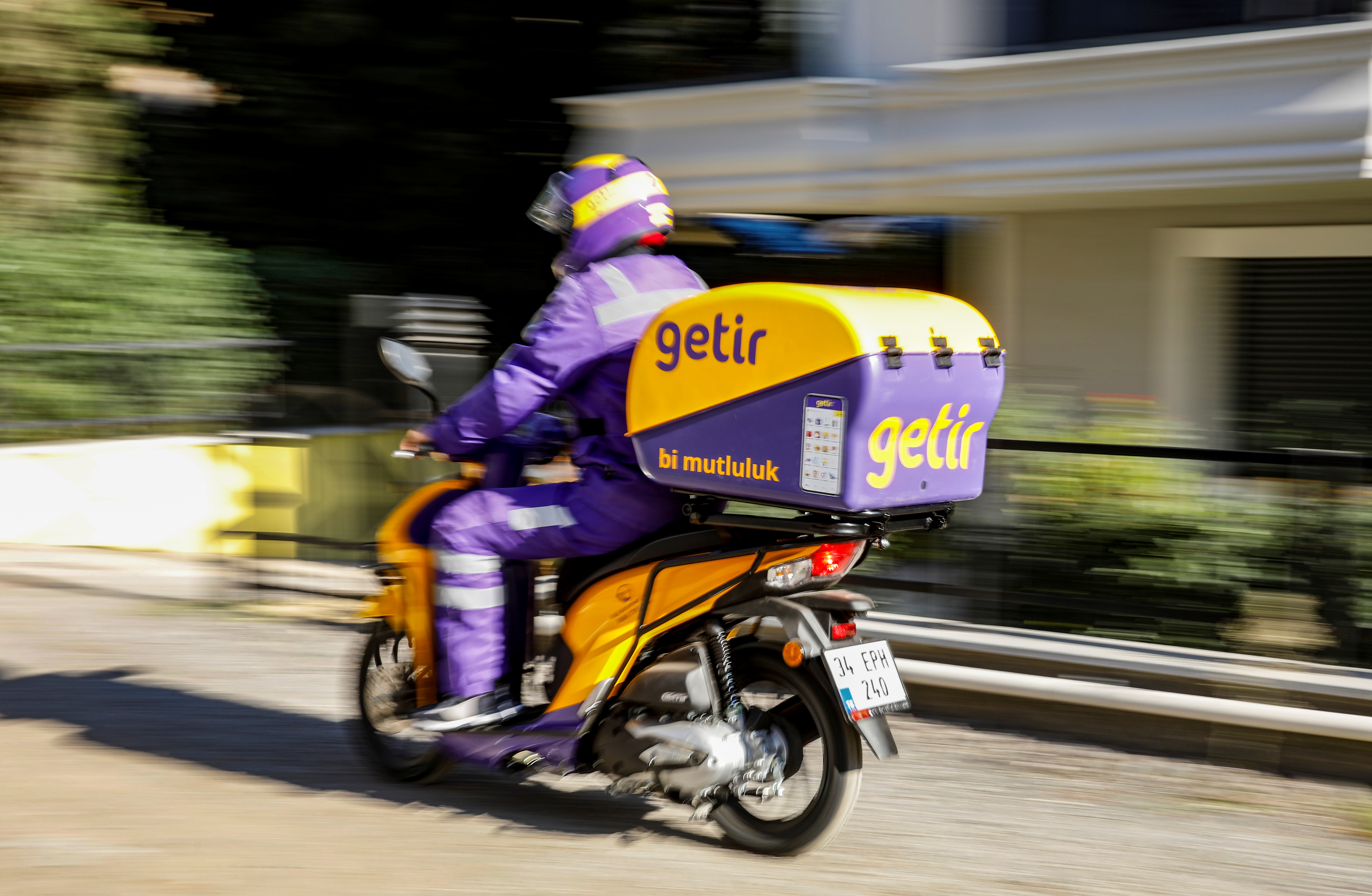 Employee of Turkish fast grocery-delivery company Getir rides to deliver an online grocery delivery in Istanbul