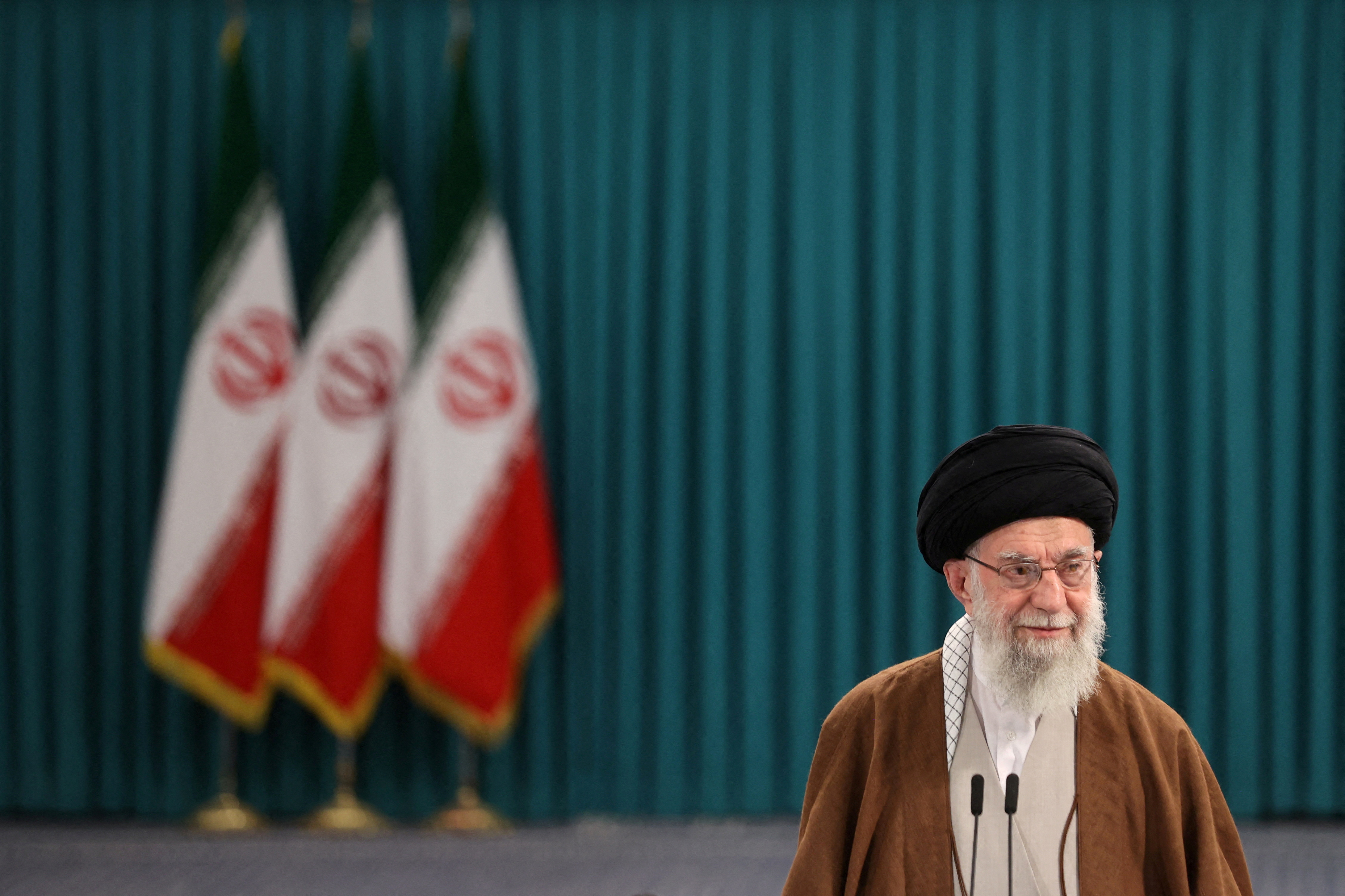 Iran's Supreme Leader Ayatollah Ali Khamenei votes during runoff parliamentary election, in Tehran