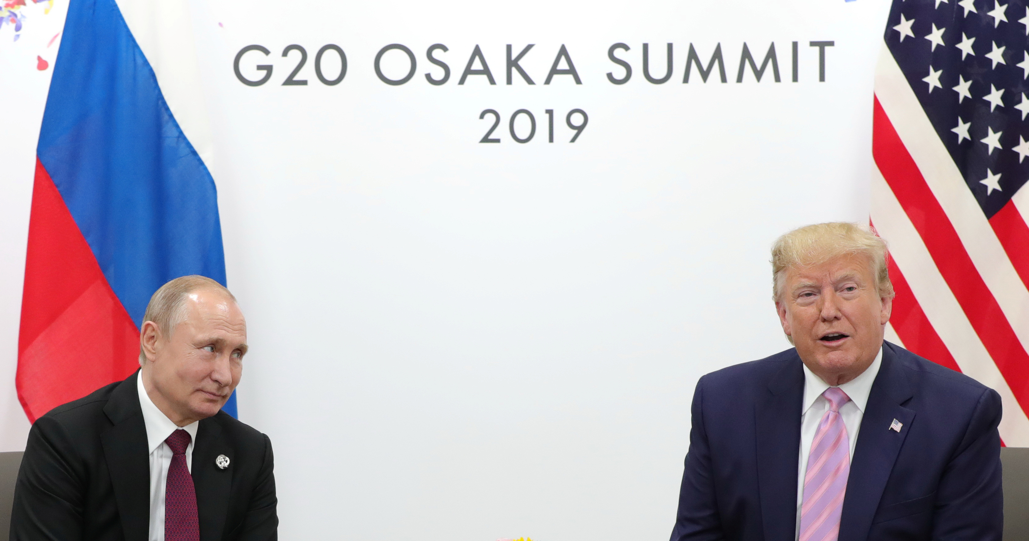 Russia's President Vladimir Putin and U.S. President Donald Trump attend a meeting on the sidelines of the G20 summit in Osaka