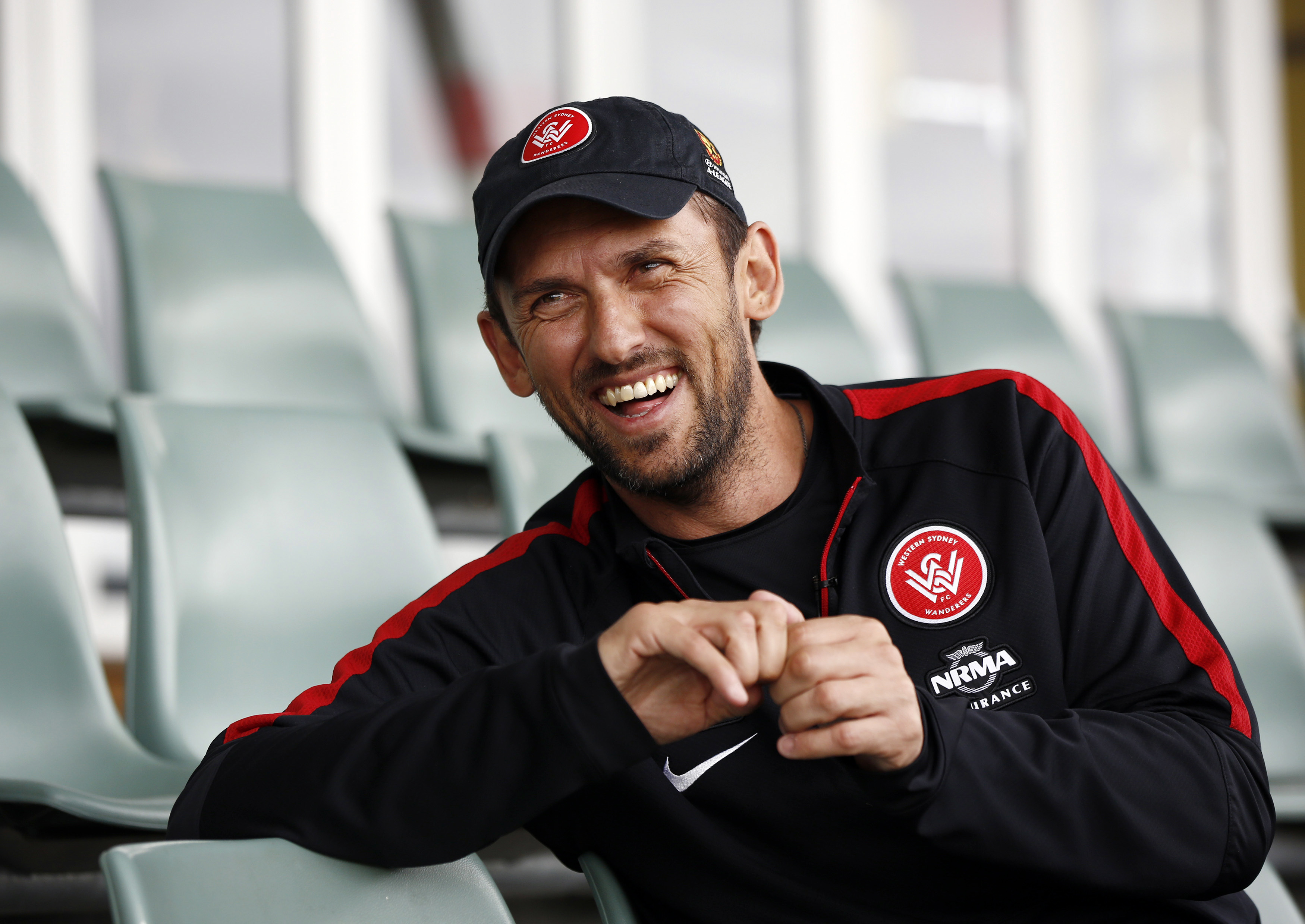Western Sydney Wanderers soccer team coach Tony Popovic laughs at the team's training facility at Rooty Hill in the western suburbs of Sydney