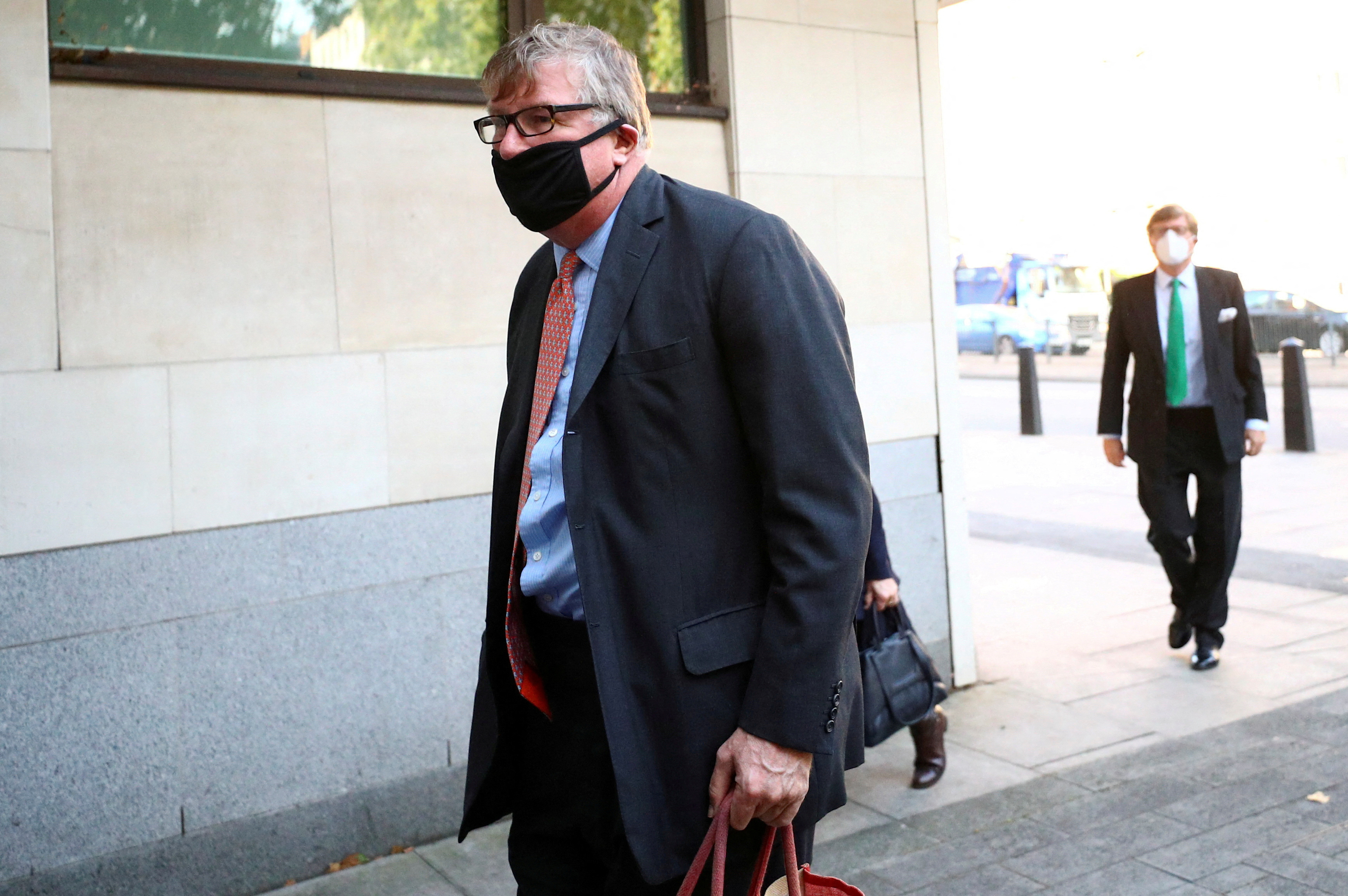 Britain's Crispin Odey arrives at Westminster Magistrates Court in London