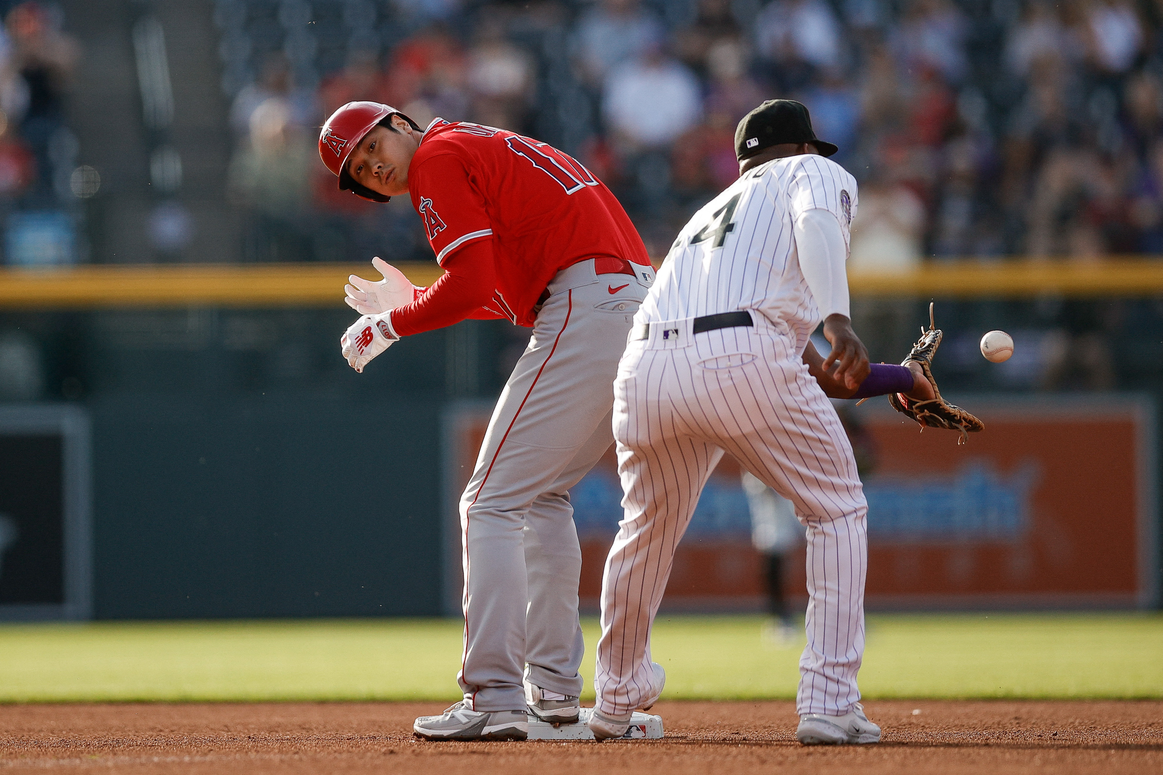 Rockies slam Angels, end eight-game losing streak