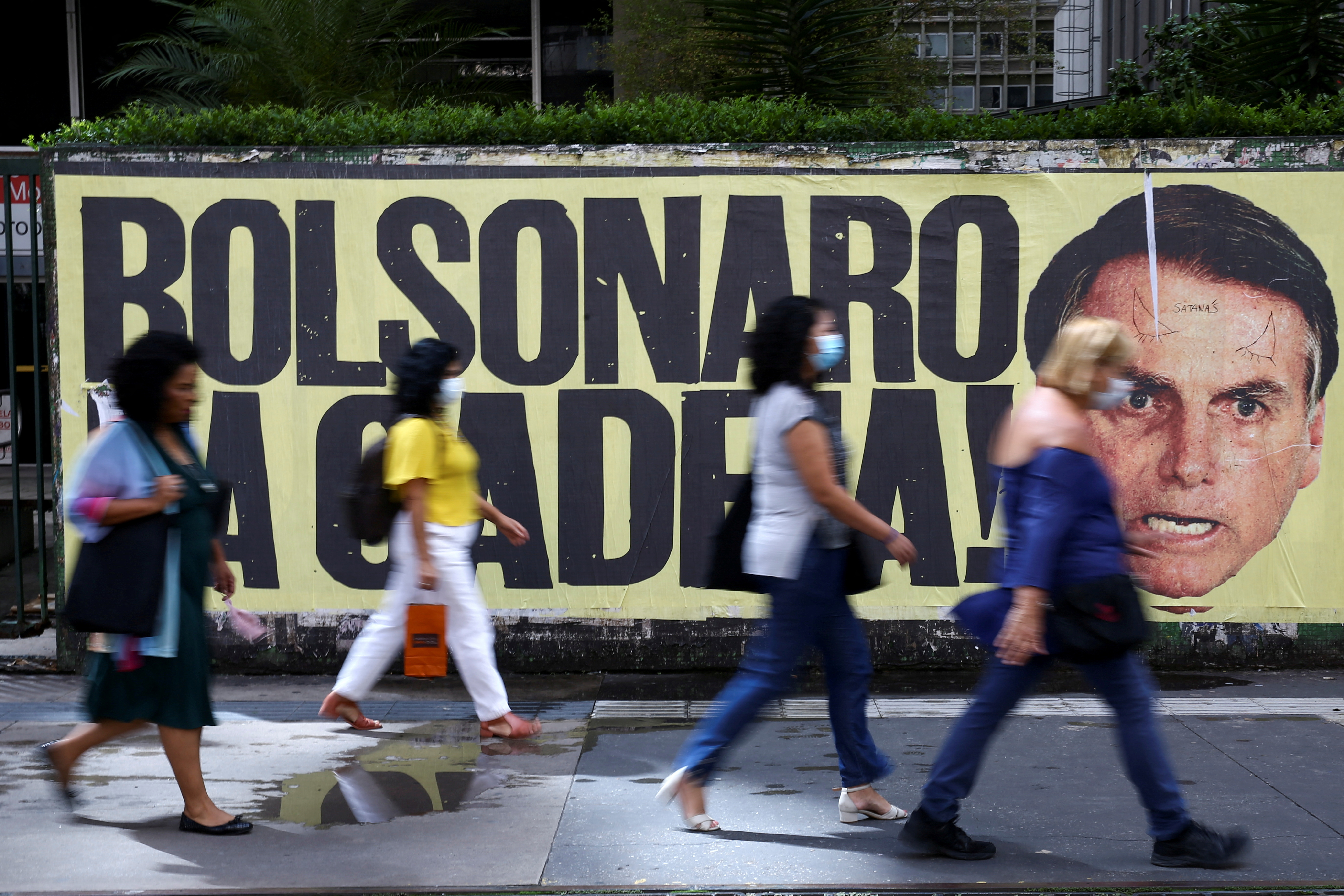 Poster against Brazil’s President Jair Bolsonaro in Sao Paulo
