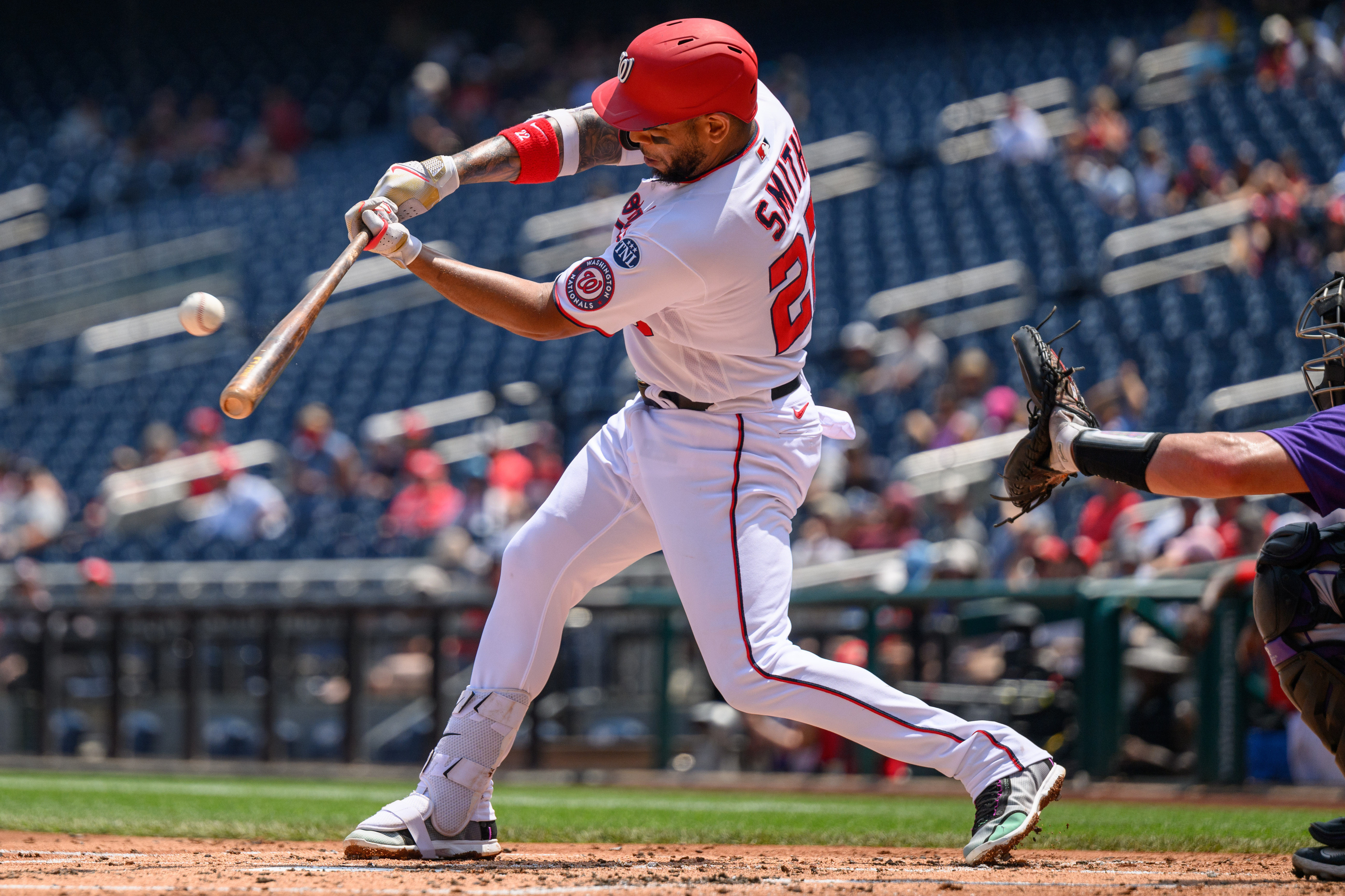 Nationals rally with 4-run ninth to edge Rockies