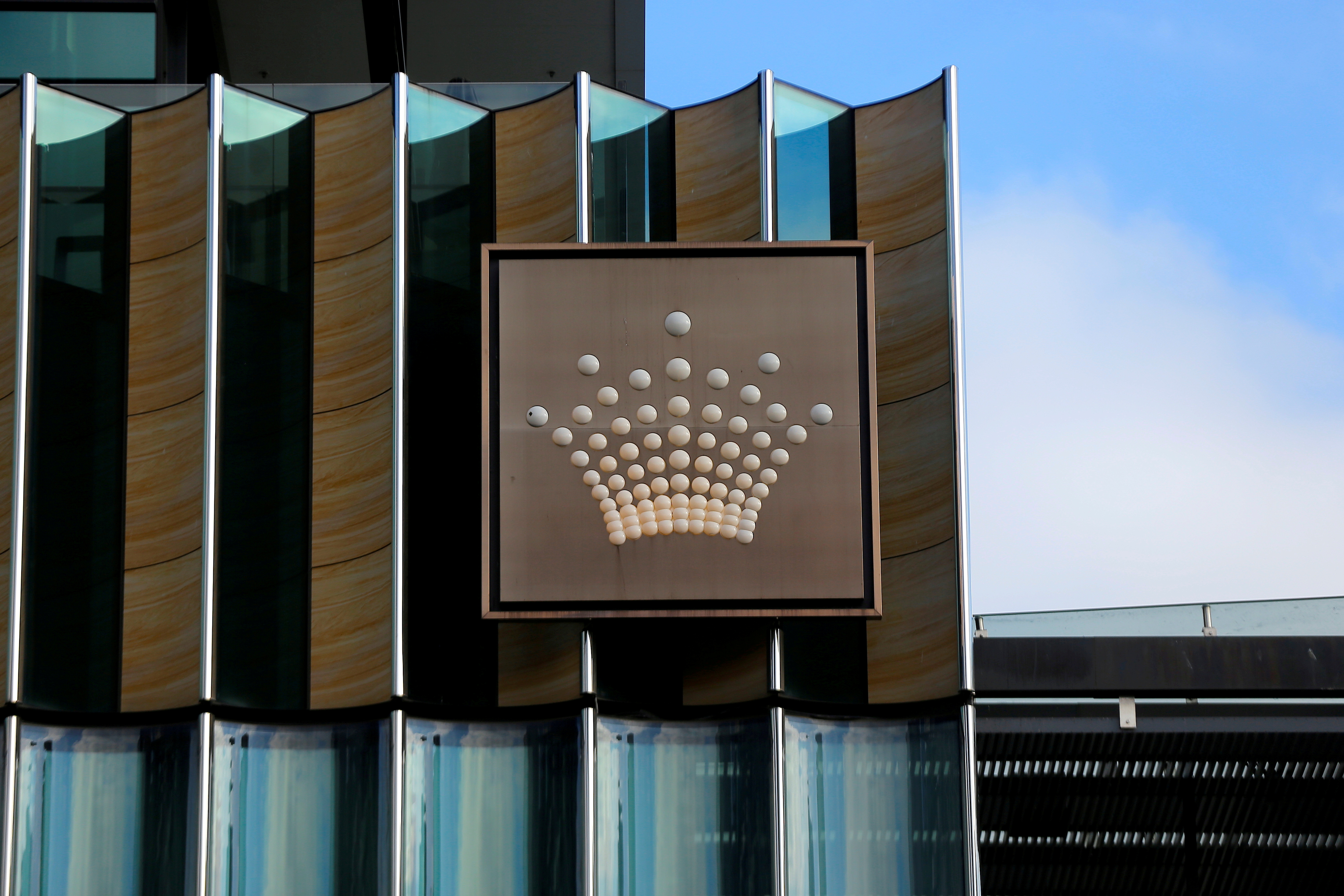 The logo of Australian casino giant Crown Resorts Ltd adorns the hotel and casino complex in Melbourne, Australia