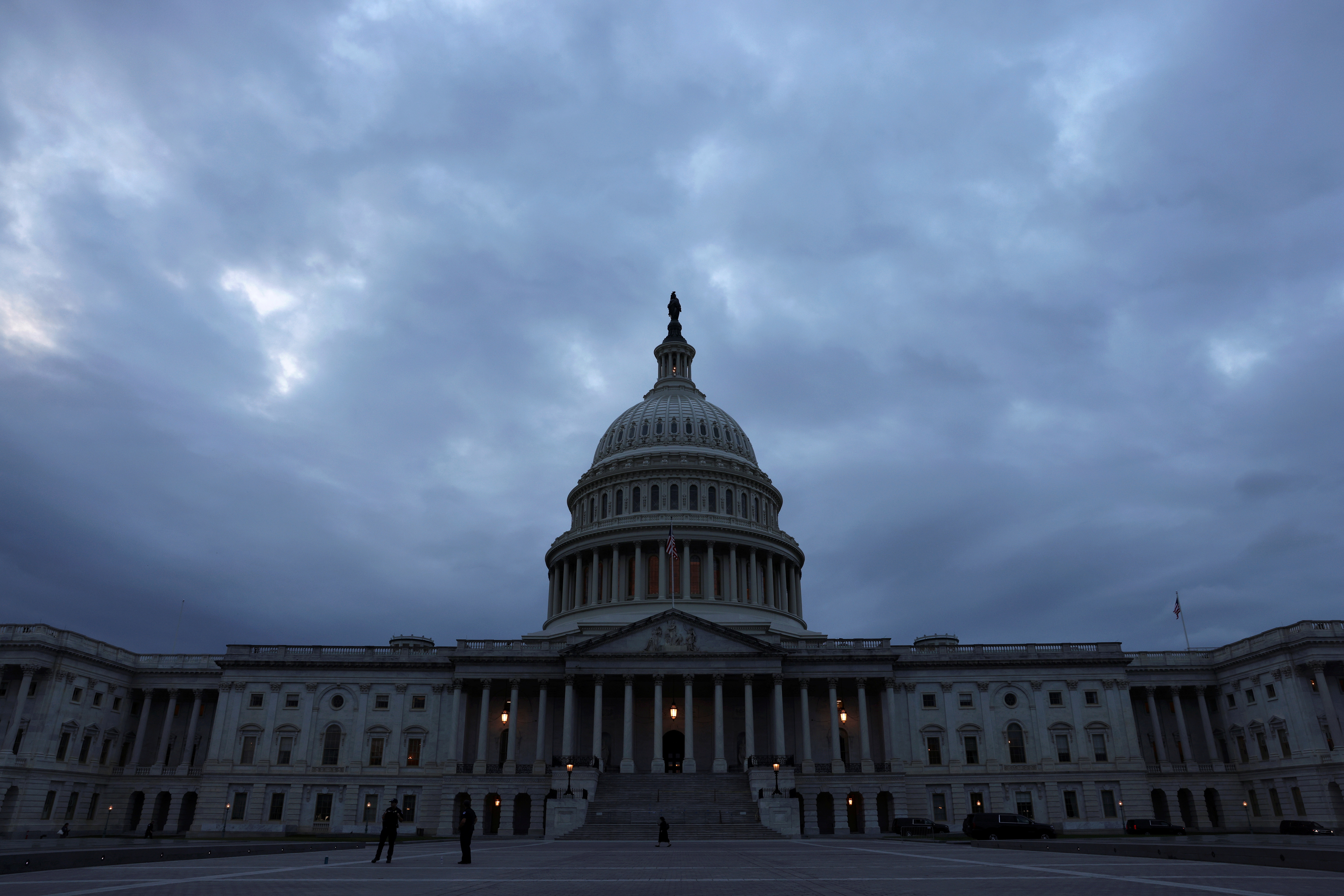 The sun sets behind the U.S. Capitol building in Washington, U.S., October 6, 2021. REUTERS/Leah Millis