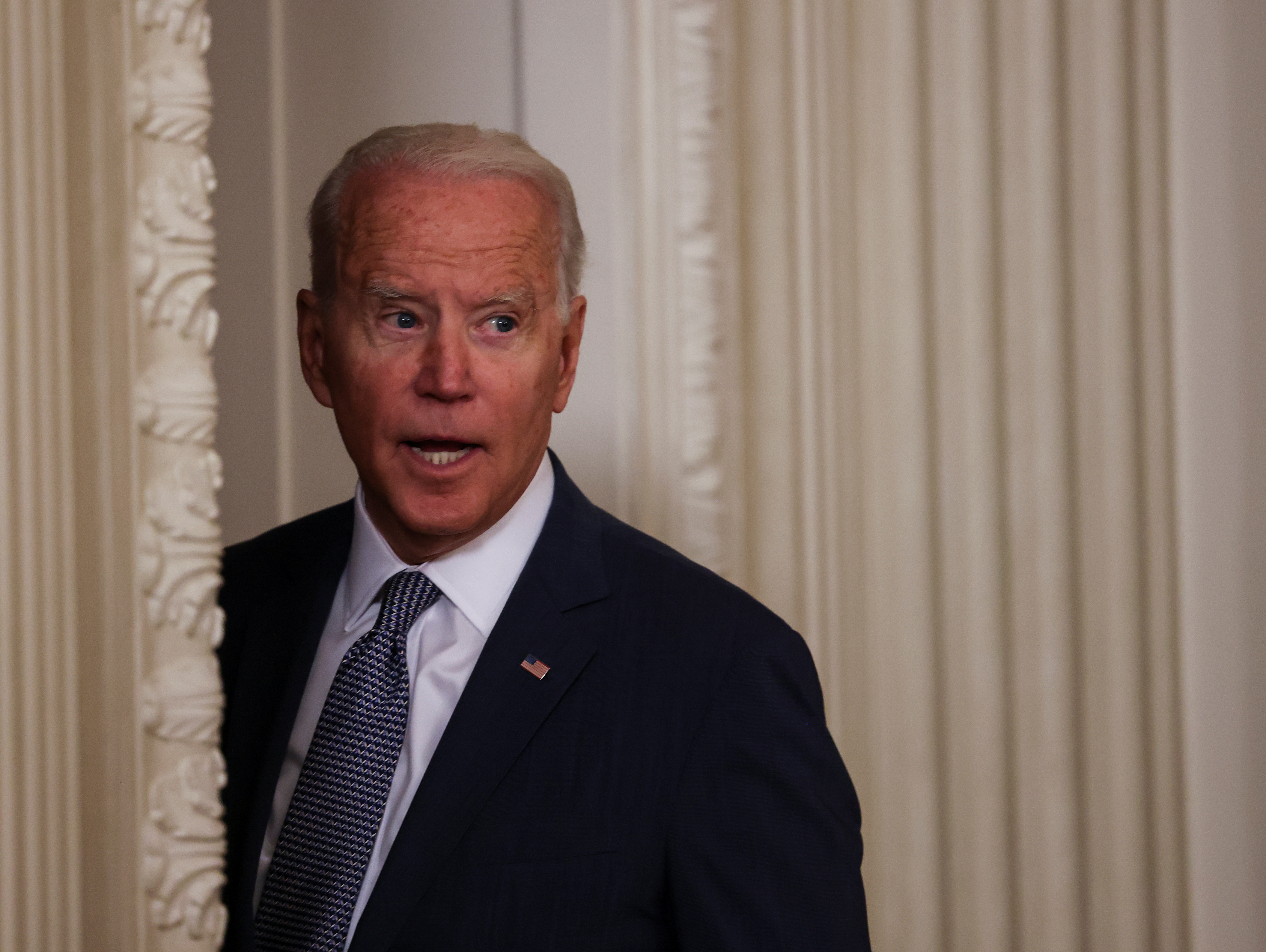 U.S. President Joe Biden delivers responds to a question as he departs after signing an executive order on "promoting competition in the American economy" in the State Dining Room at the White House in Washington U.S., July 9, 2021. REUTERS/Evelyn Hockstein