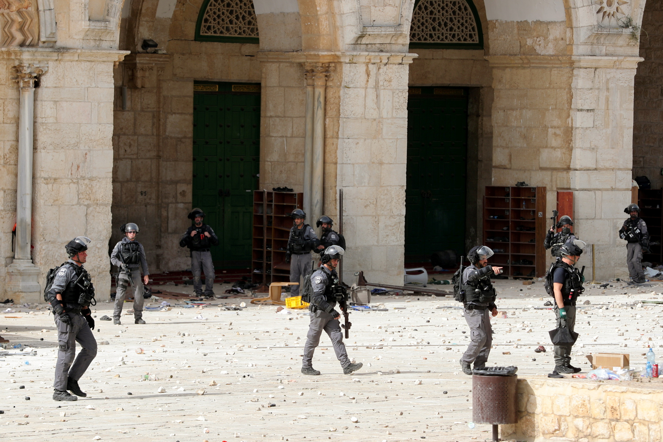 Israeli police gather as they clash with Palestinians at the compound that houses Al-Aqsa Mosque, known to Muslims as Noble Sanctuary and to Jews as Temple Mount, in Jerusalem's Old City, May 10, 2021. REUTERS/Ammar Awad