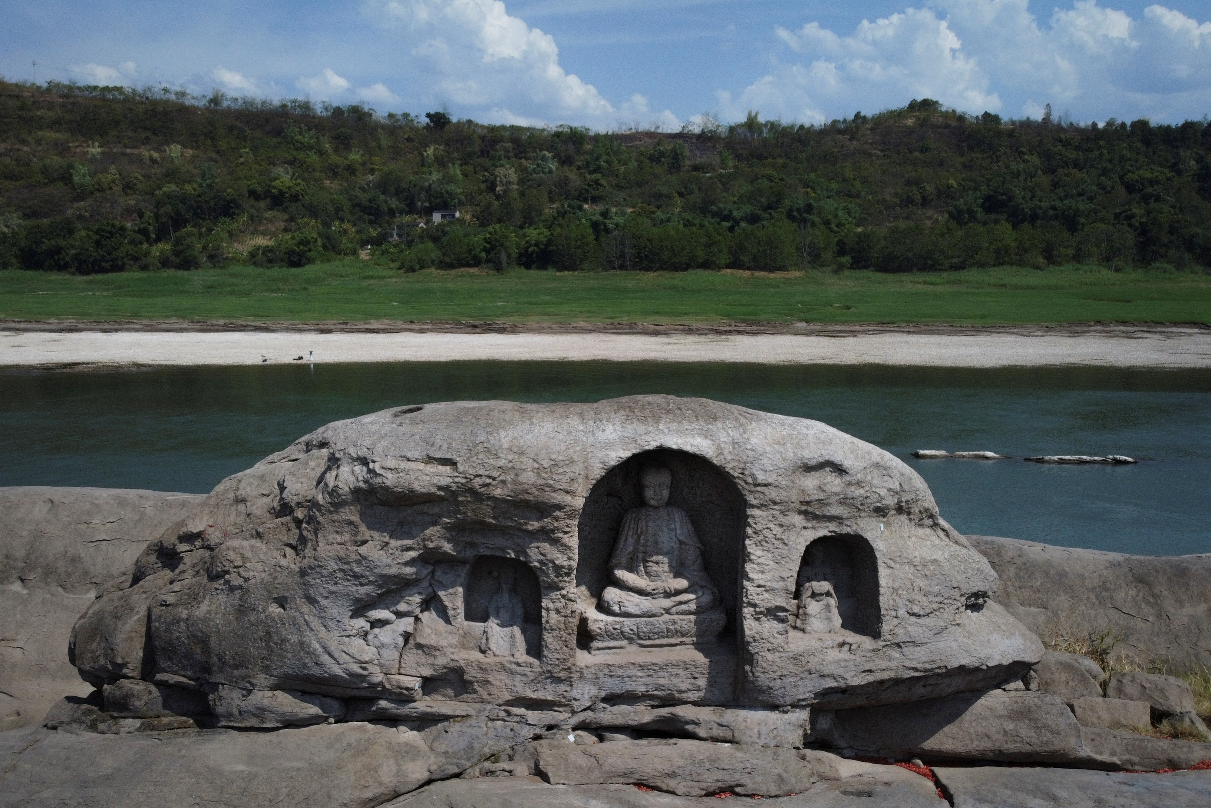 Receding water levels of China's Yangtze reveal ancient Buddhist statues |  Reuters