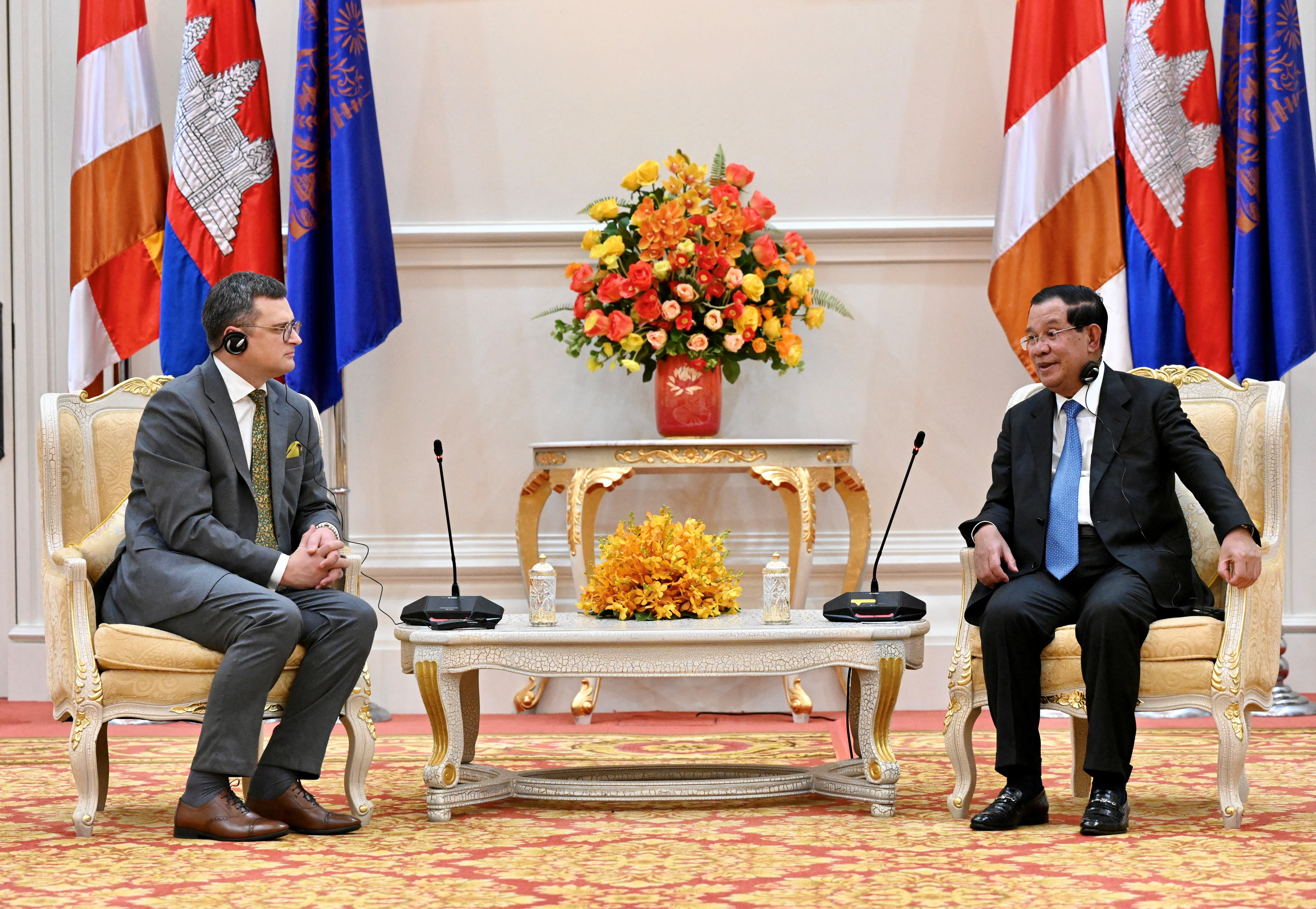 Cambodian Prime Minister Hun Sen welcomes Ukrainian Foreign Minister Dmytro Kuleba ahead of the ASEAN Summit at the Peace Palace in Phnom Penh