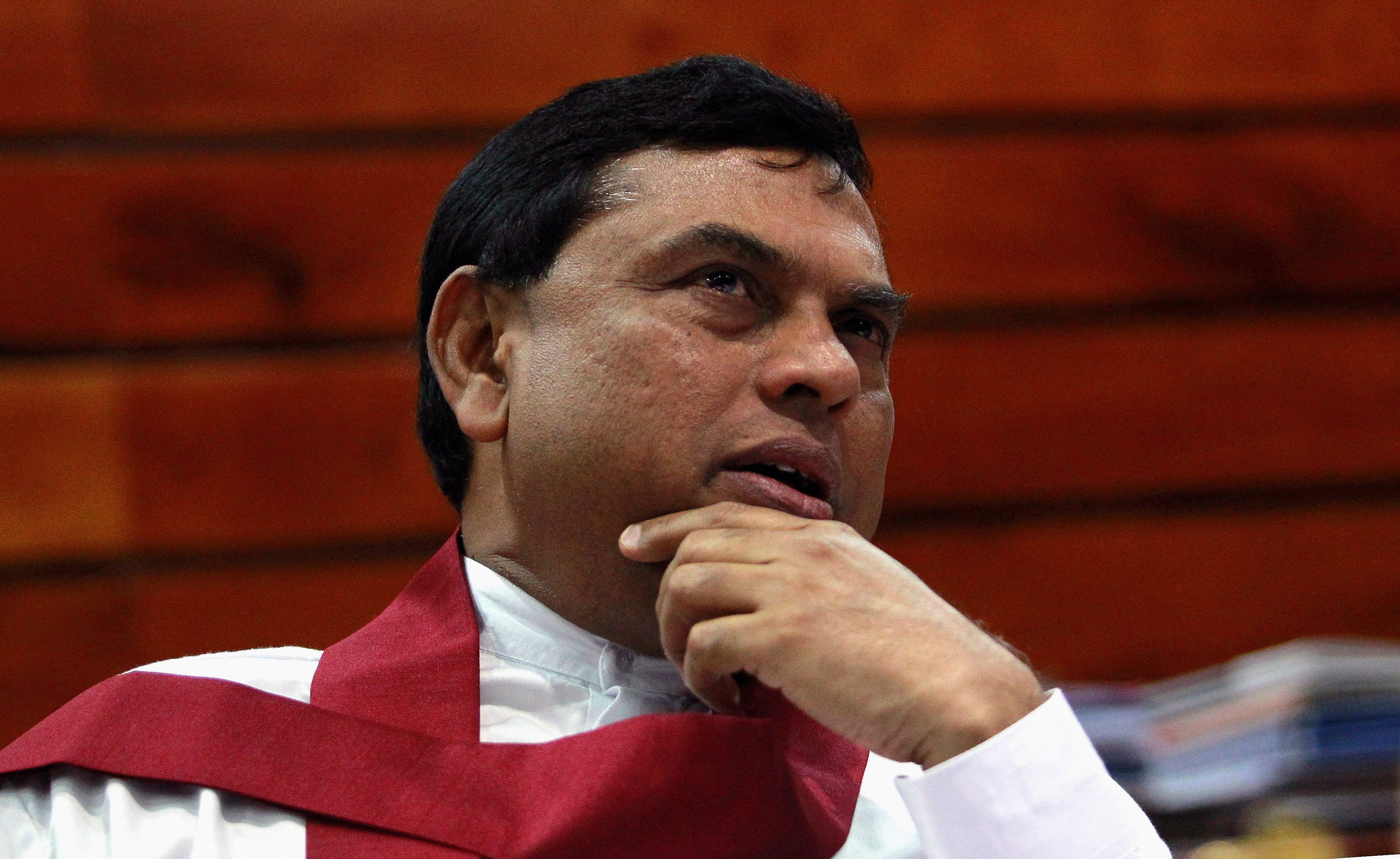 Sri Lanka president s brother Basil Rajapaksa resigns from