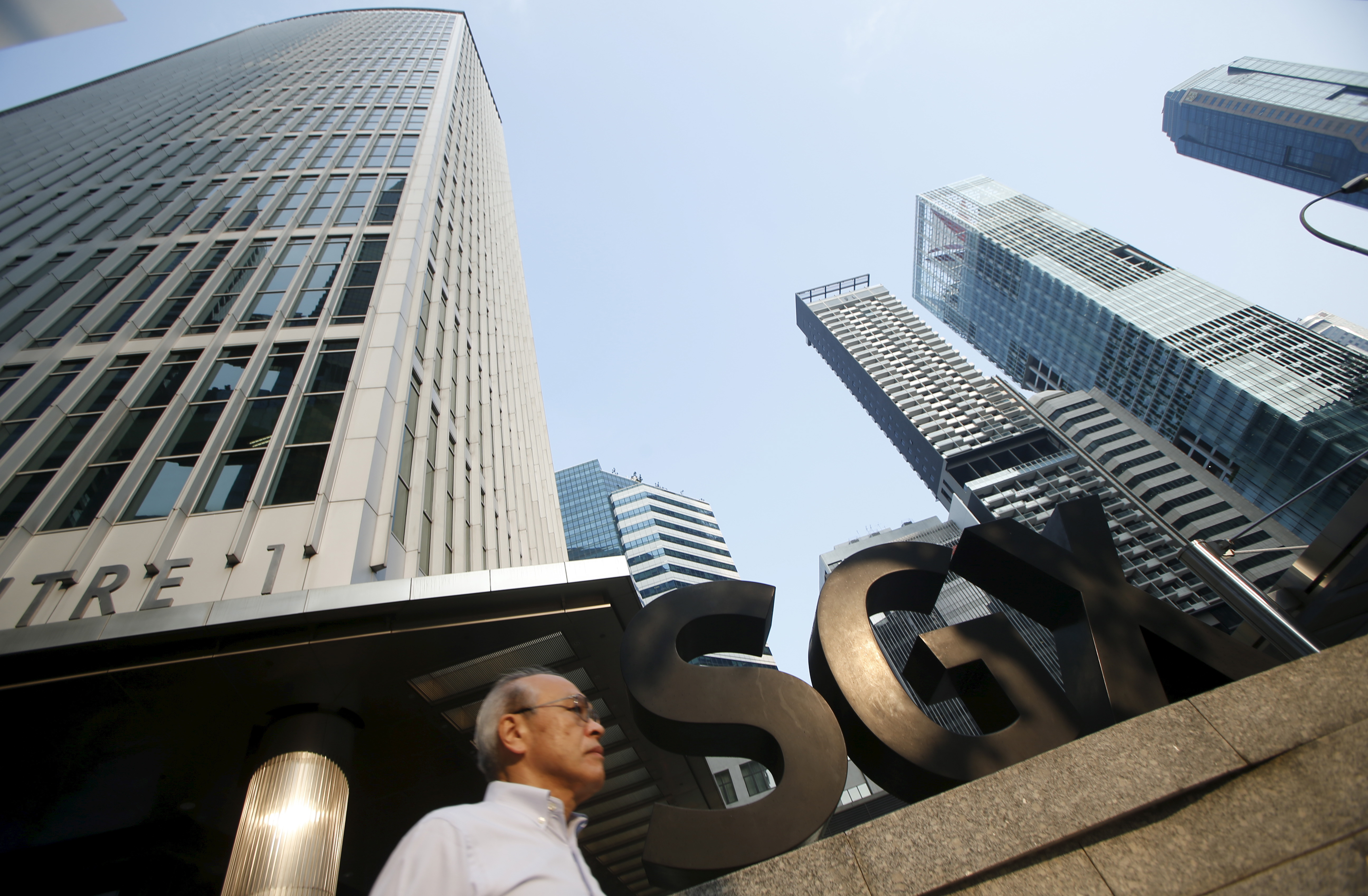 Singapore woos growth firms with plans to make SGX-Nasdaq dual listing  easier | Reuters