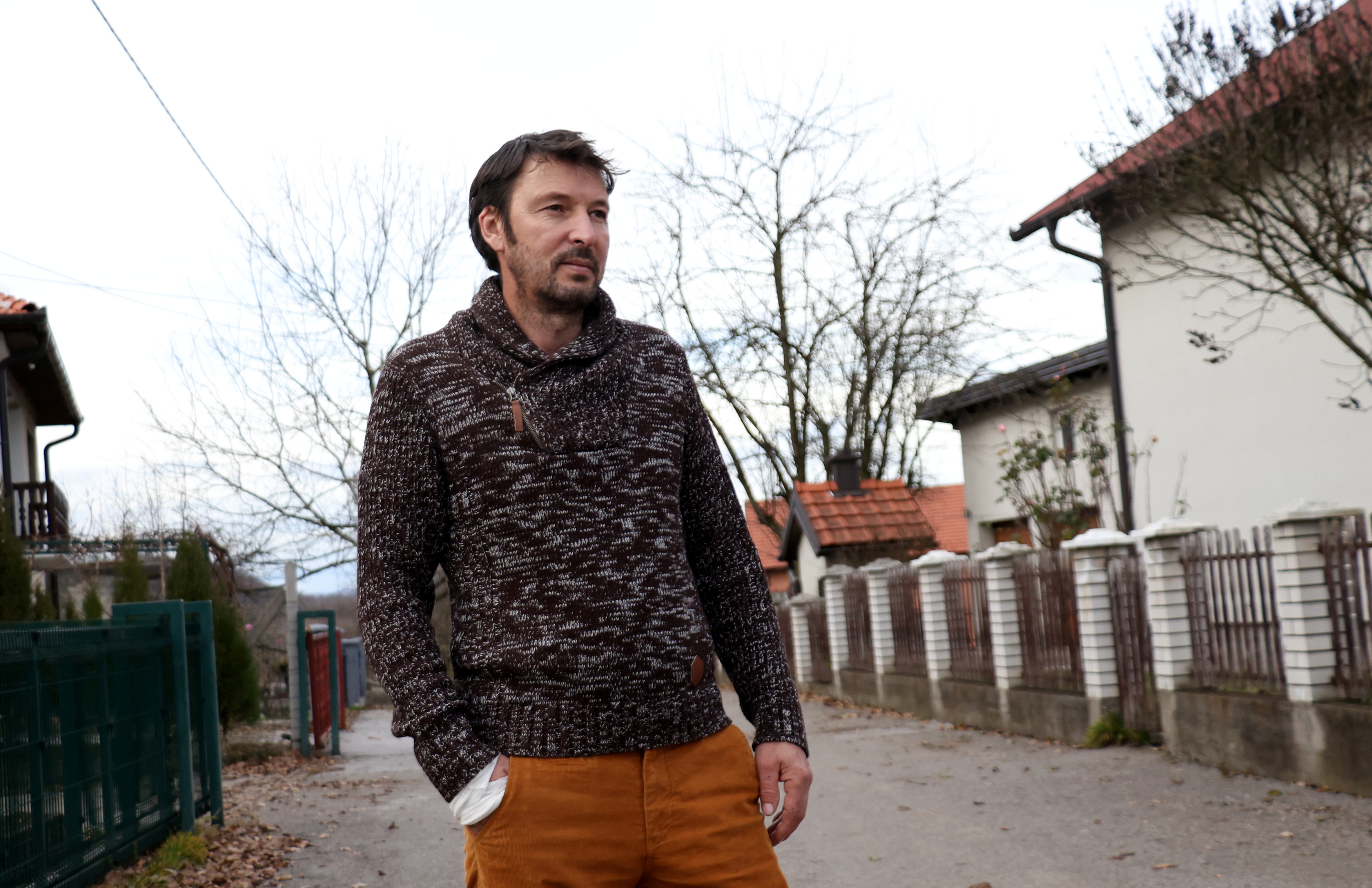 Goran Stojak, the leader of the Bukinje community, speaks during an interview with Reuters in Tuzla