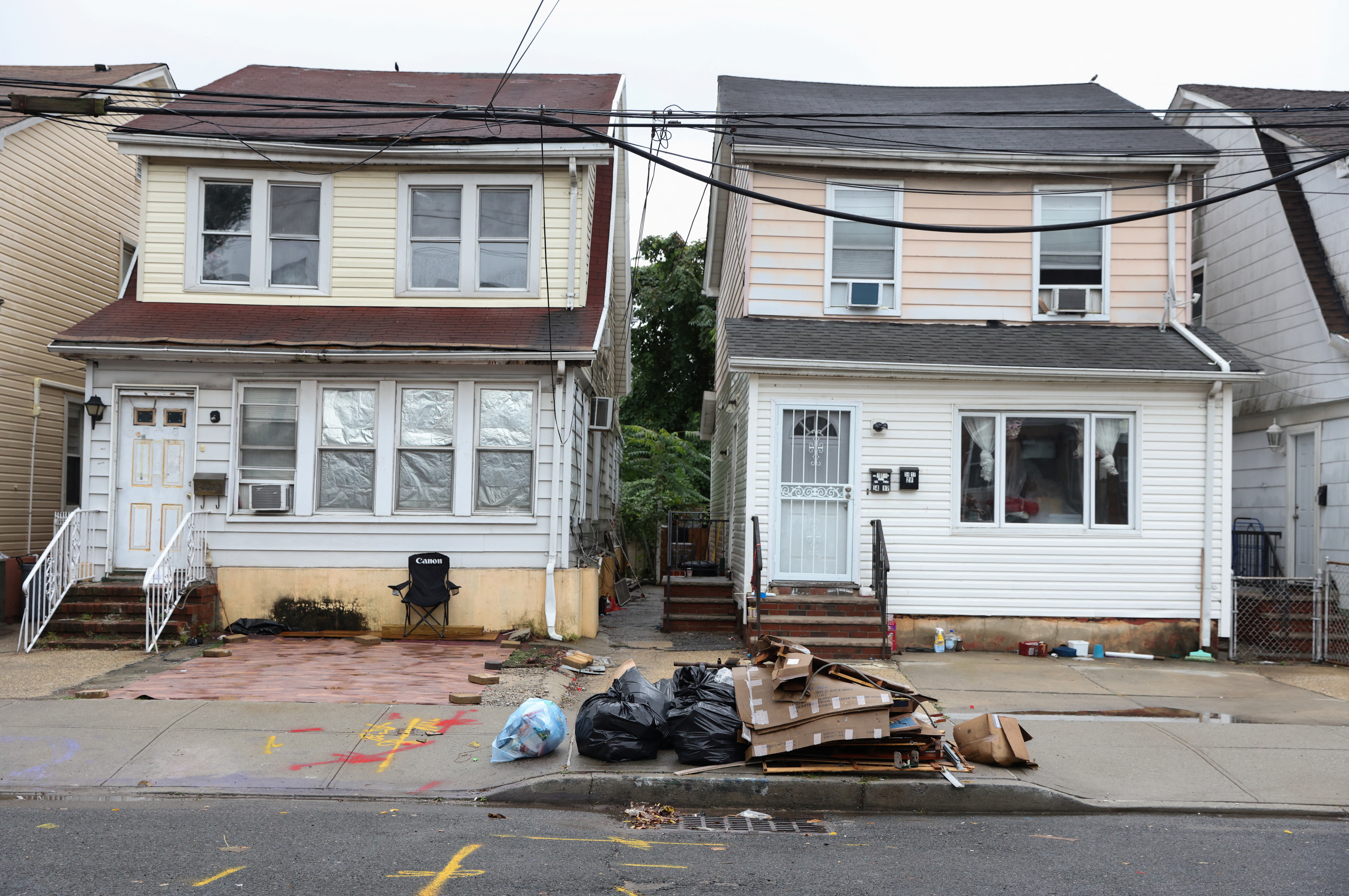 Damage from flooding during the aftermath of Hurricane Ida is still being cleaned up in Queens, during a Nor’easter in New York