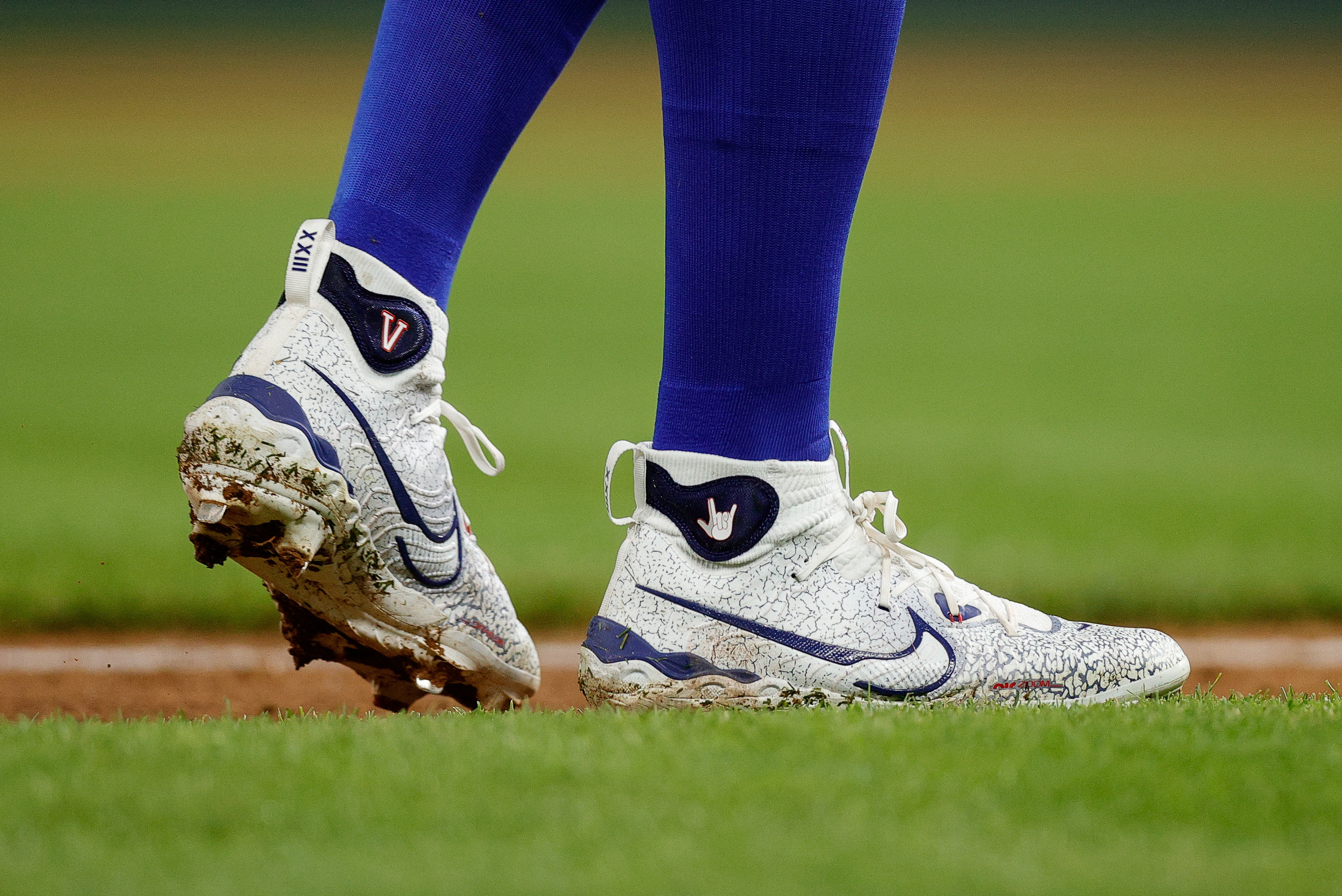 Martinez helps power Dodgers past Rockies 14-3 after a severe weather delay