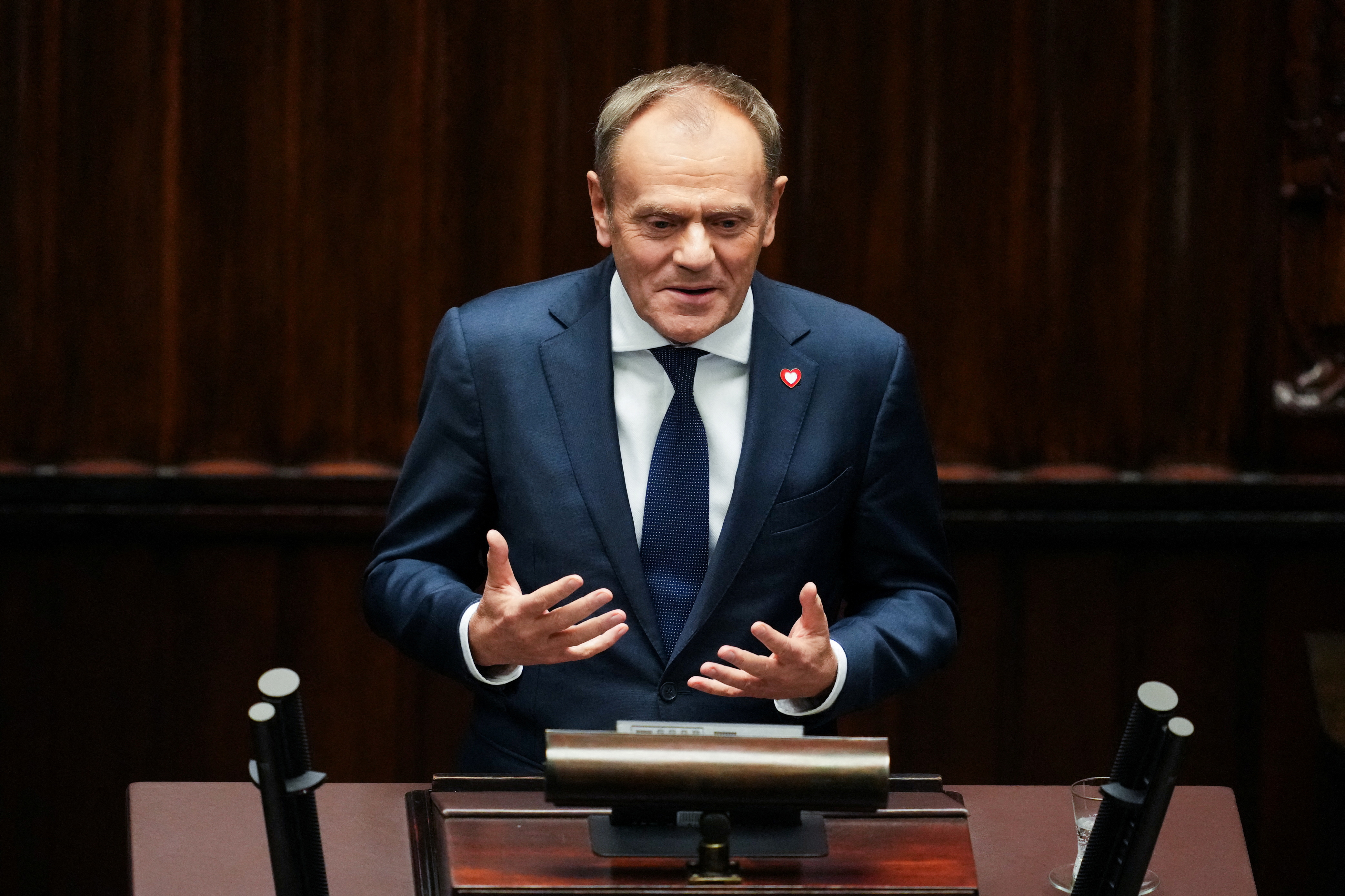 Newly appointed Polish Prime Minister Donald Tusk speaks during a parliament session, in Warsaw