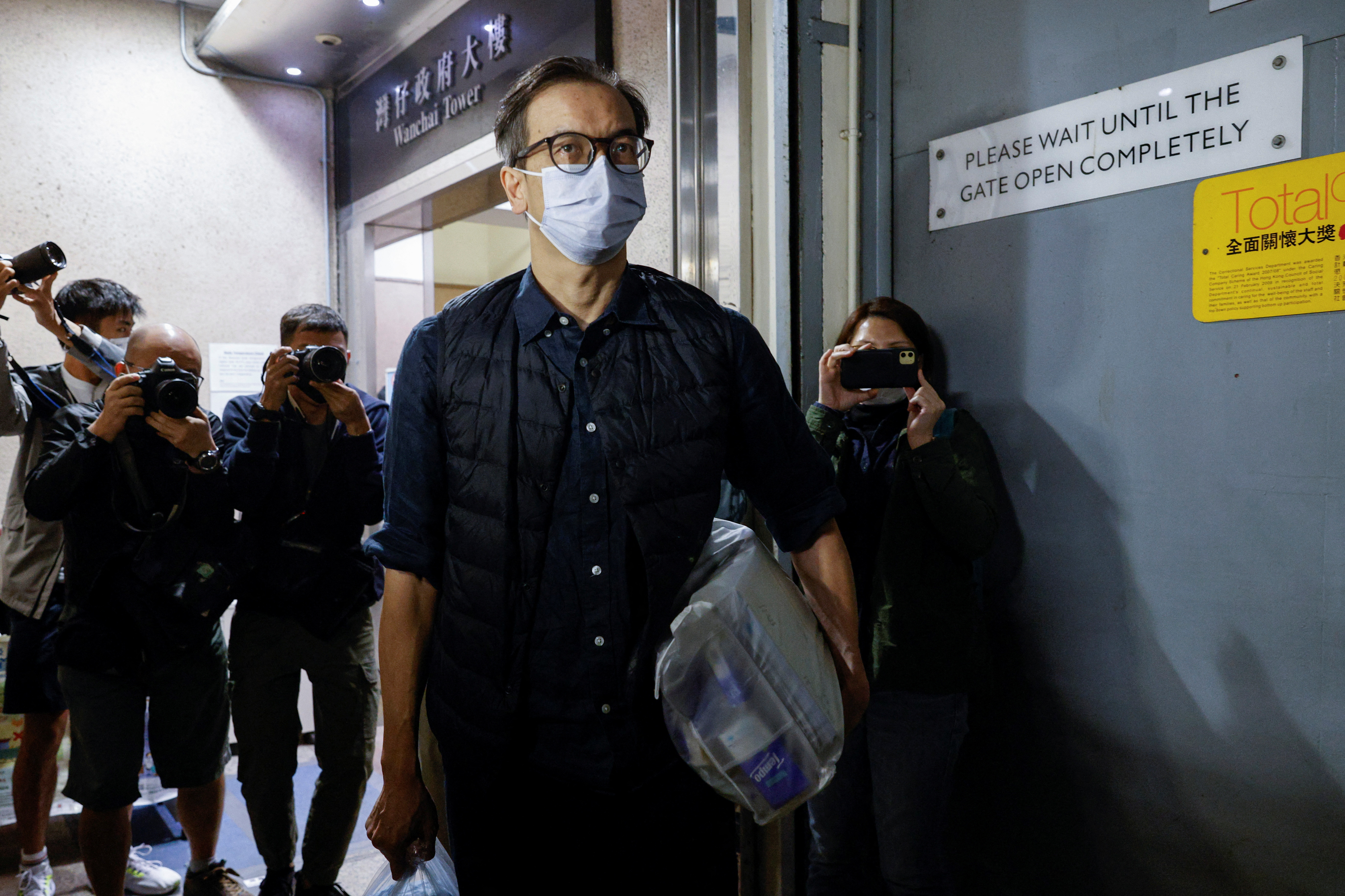 Former Stand News editor-in-chief Chung Pui-kuen leaves the court after release on bail over his charge of conspiring to publish "Seditious Publications" in Hong Kong