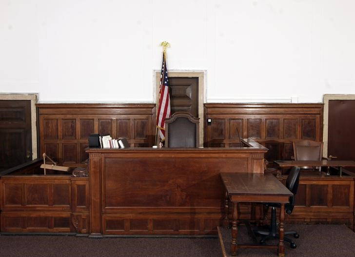 The judge's chair, the witness stand and stenographer's desk are seen in court room 422 of the New York Supreme Court