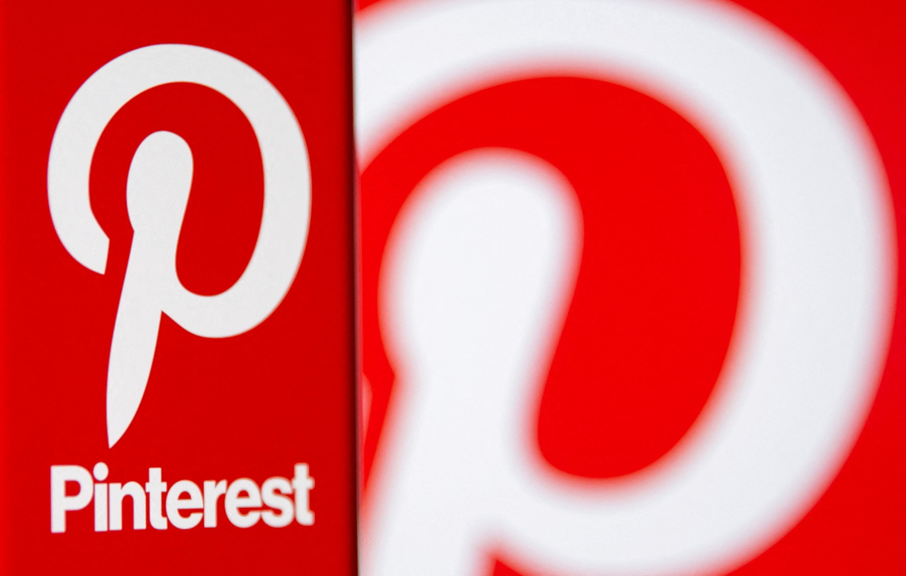 Pinterest logo is seen on smartphone in this illustration