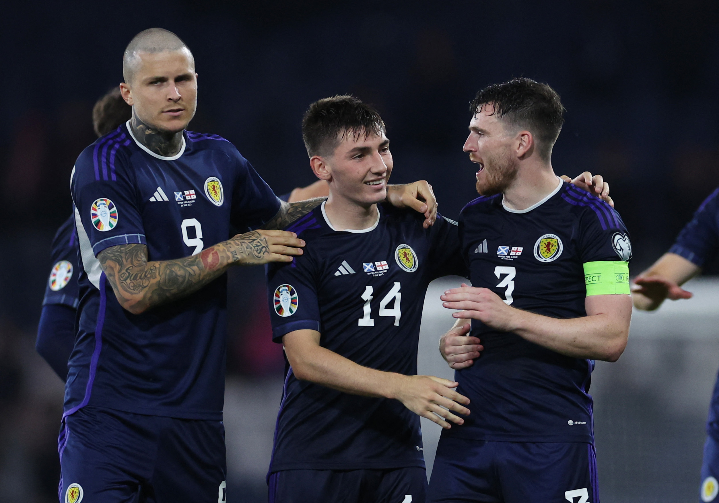 Scotland beat in match suspended for over an hour after