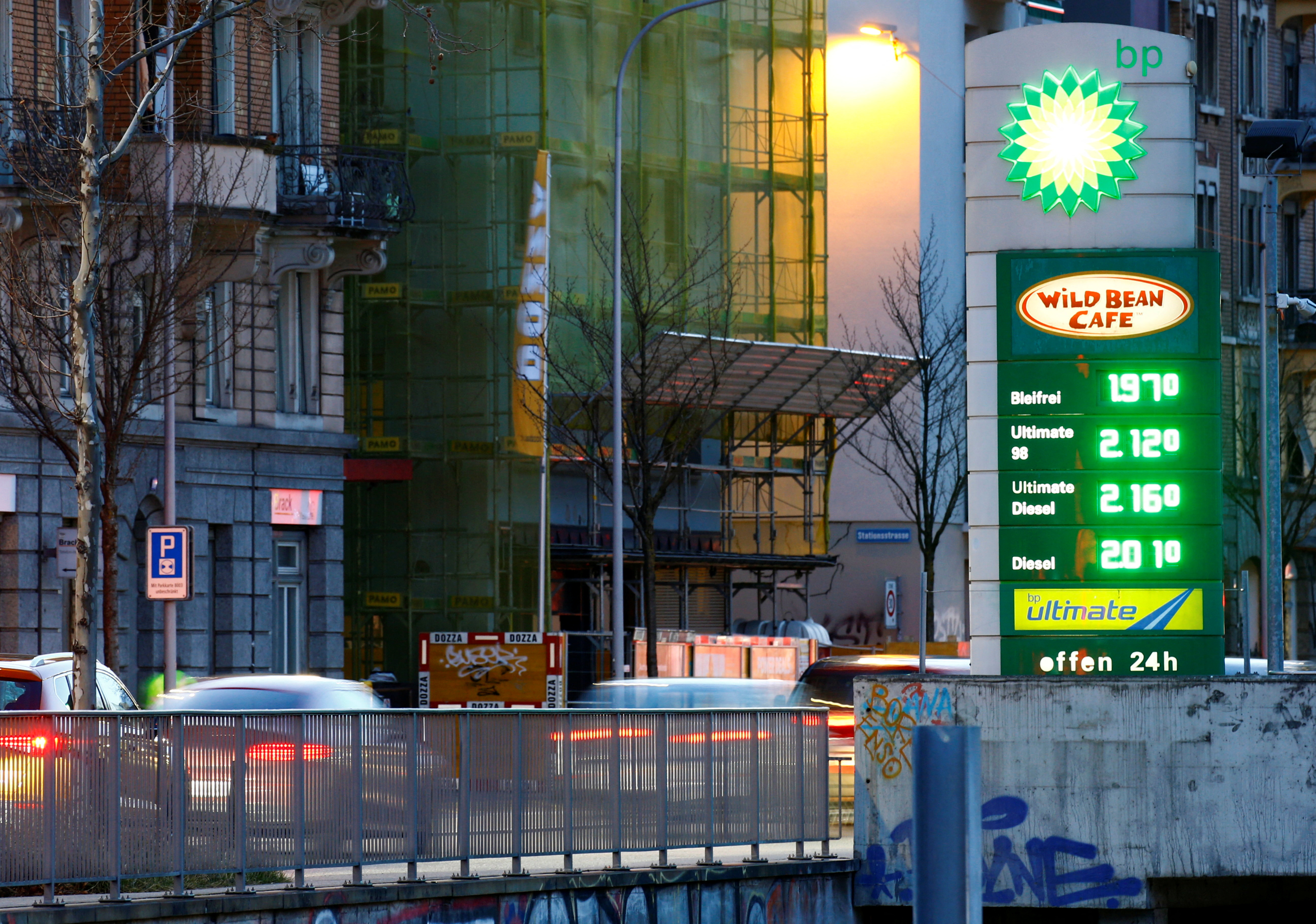 A display shows fuel prices at a BP gas station in Zurich