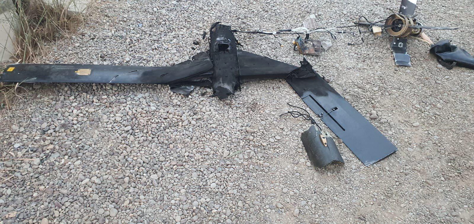 The remains of the wreckage of a drone are seen at Baghdad airport