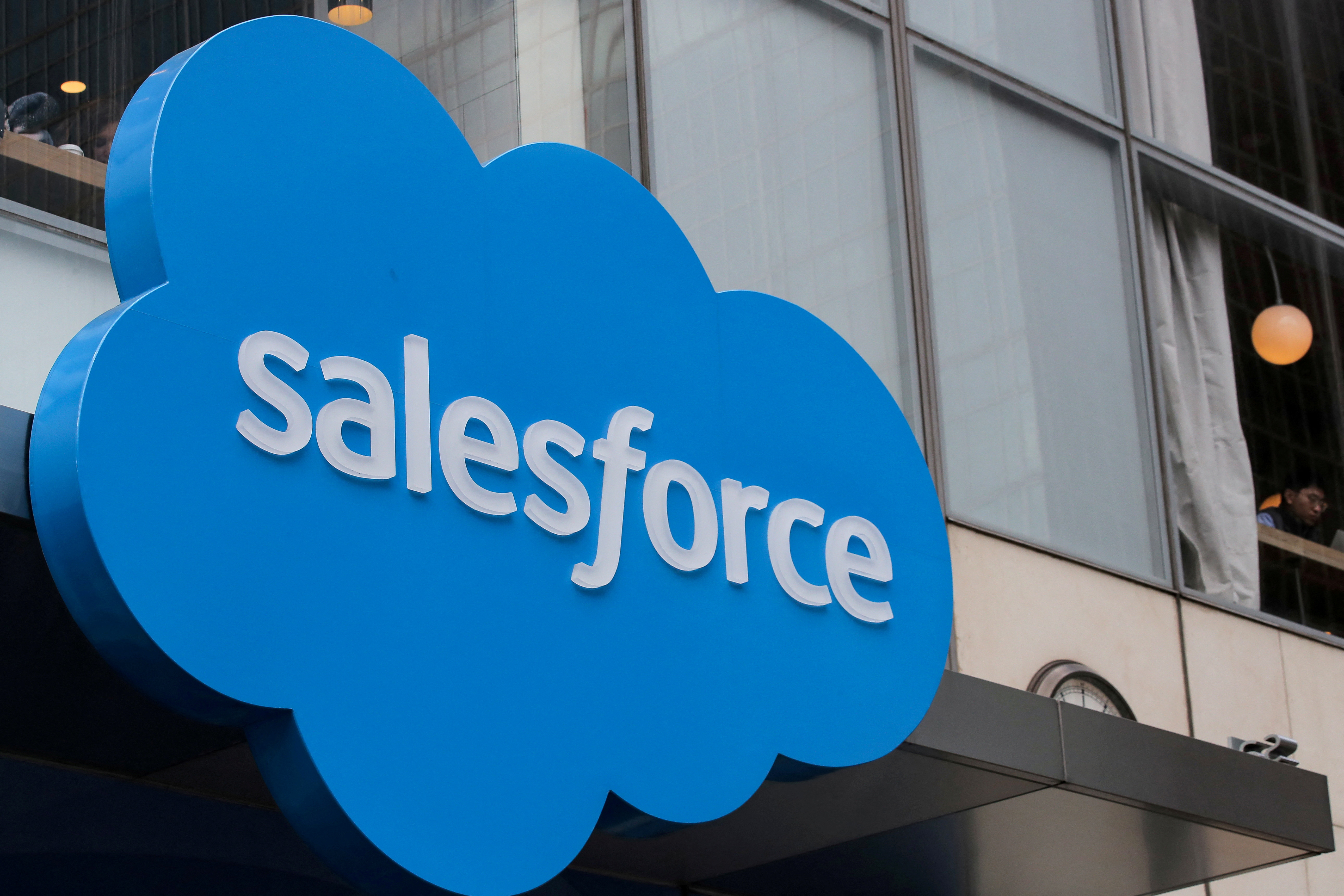 The company logo for Salesforce.com is displayed on the Salesforce Tower in New York