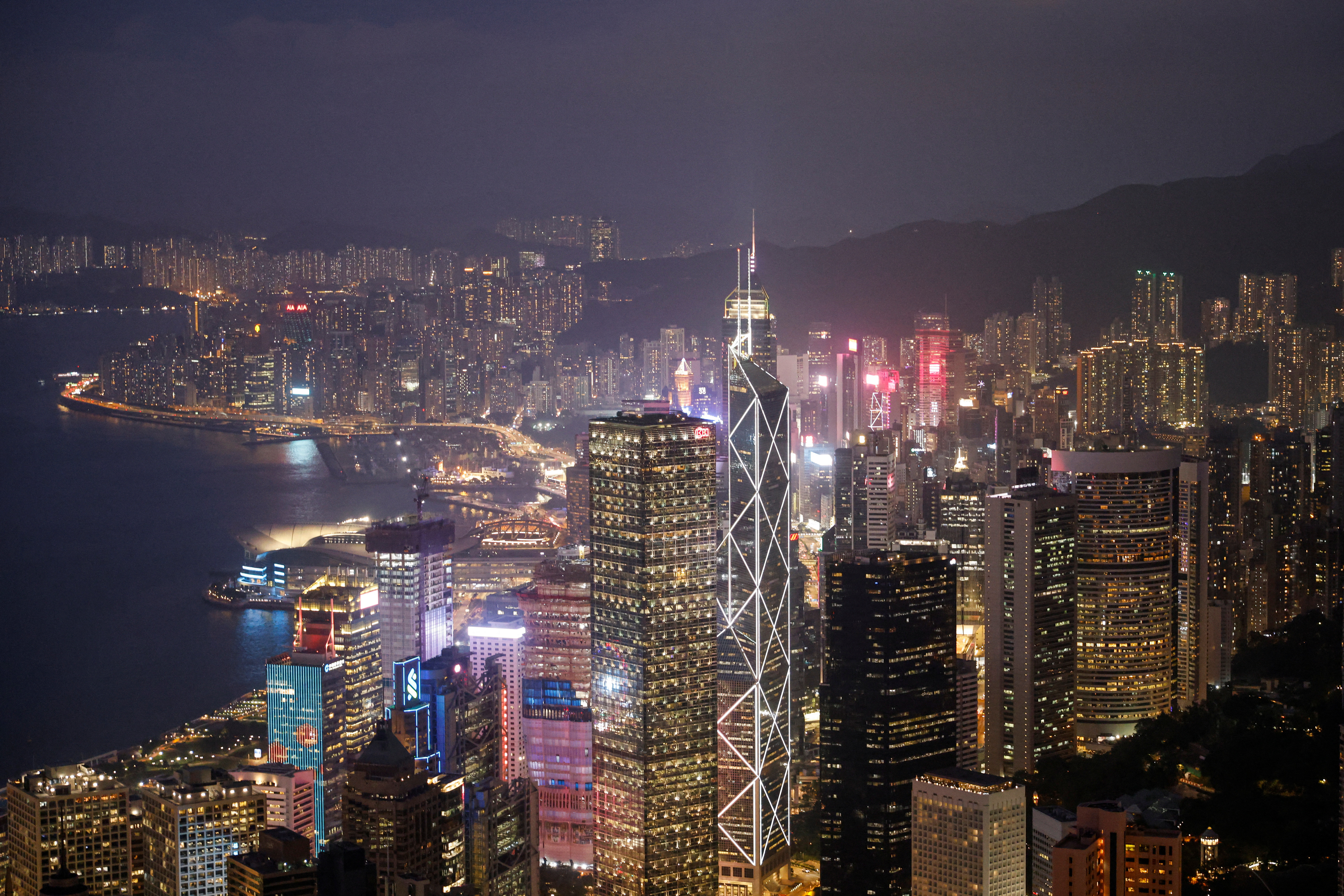 An evening view of the financial Central district and Victoria Harbour in Hong Kong
