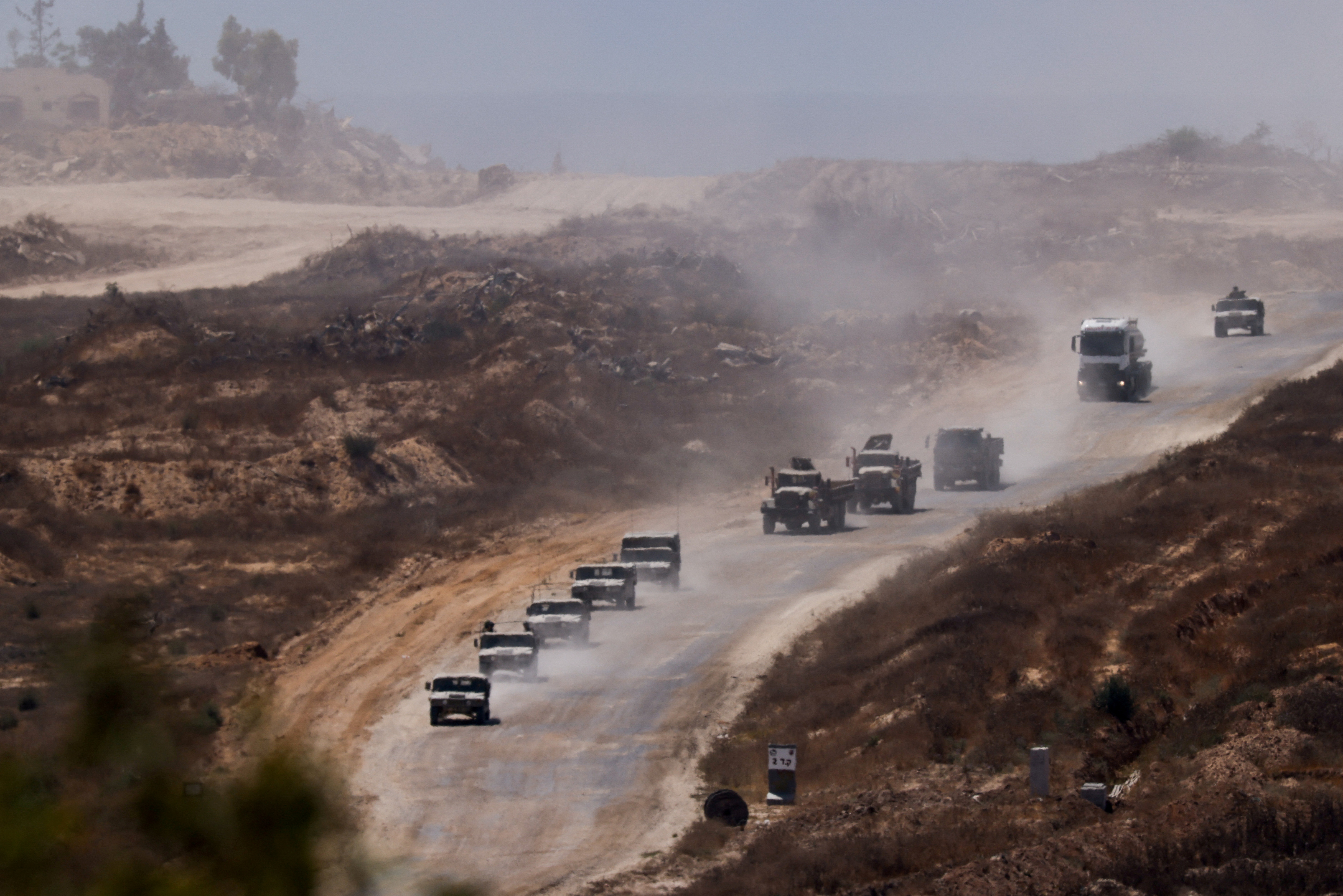 An Israeli military convoy moves inside the Gaza Strip