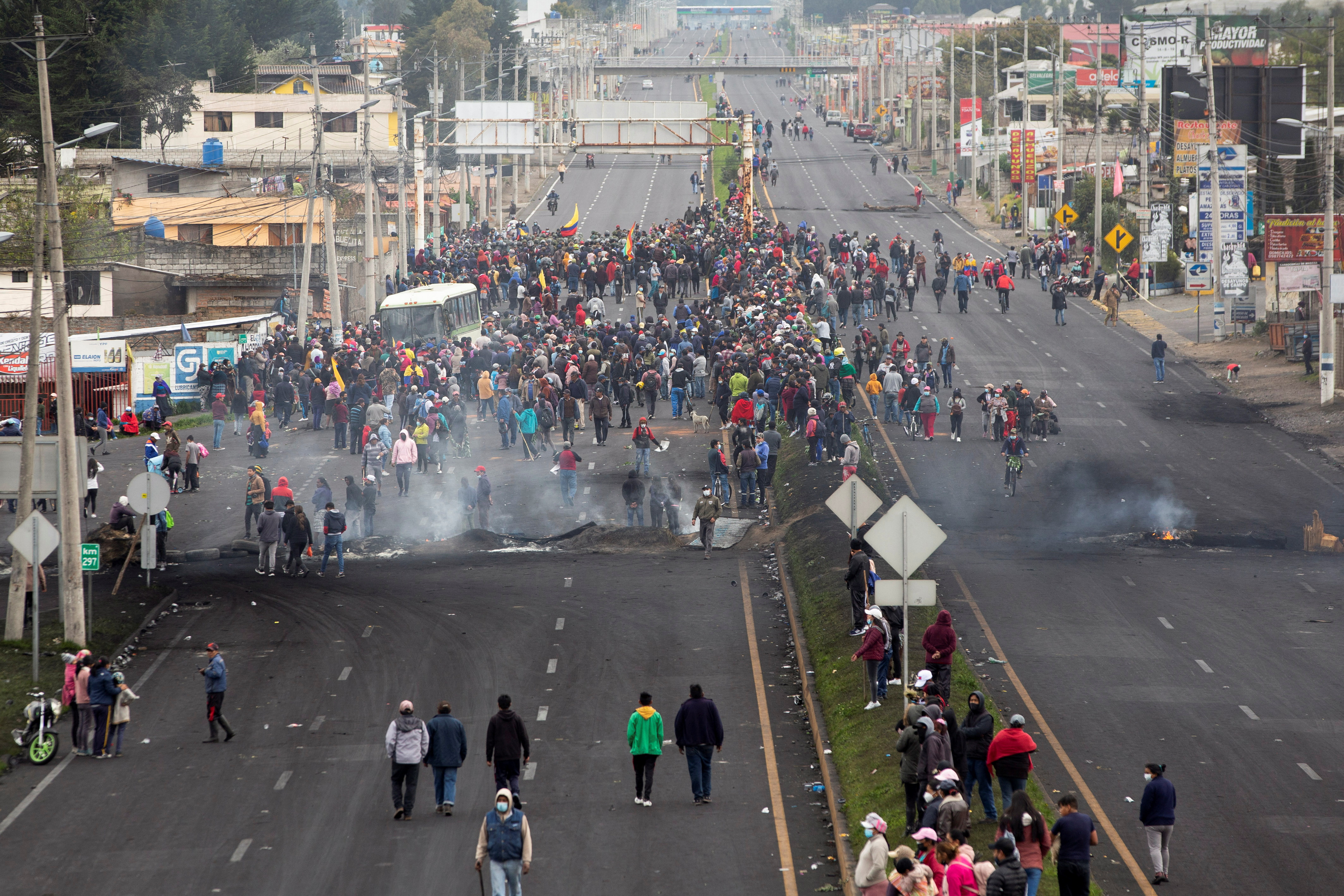 Indigenous demonstrators march towards Quito after a week of protests against Ecuadoran President  Lasso, in Machachi