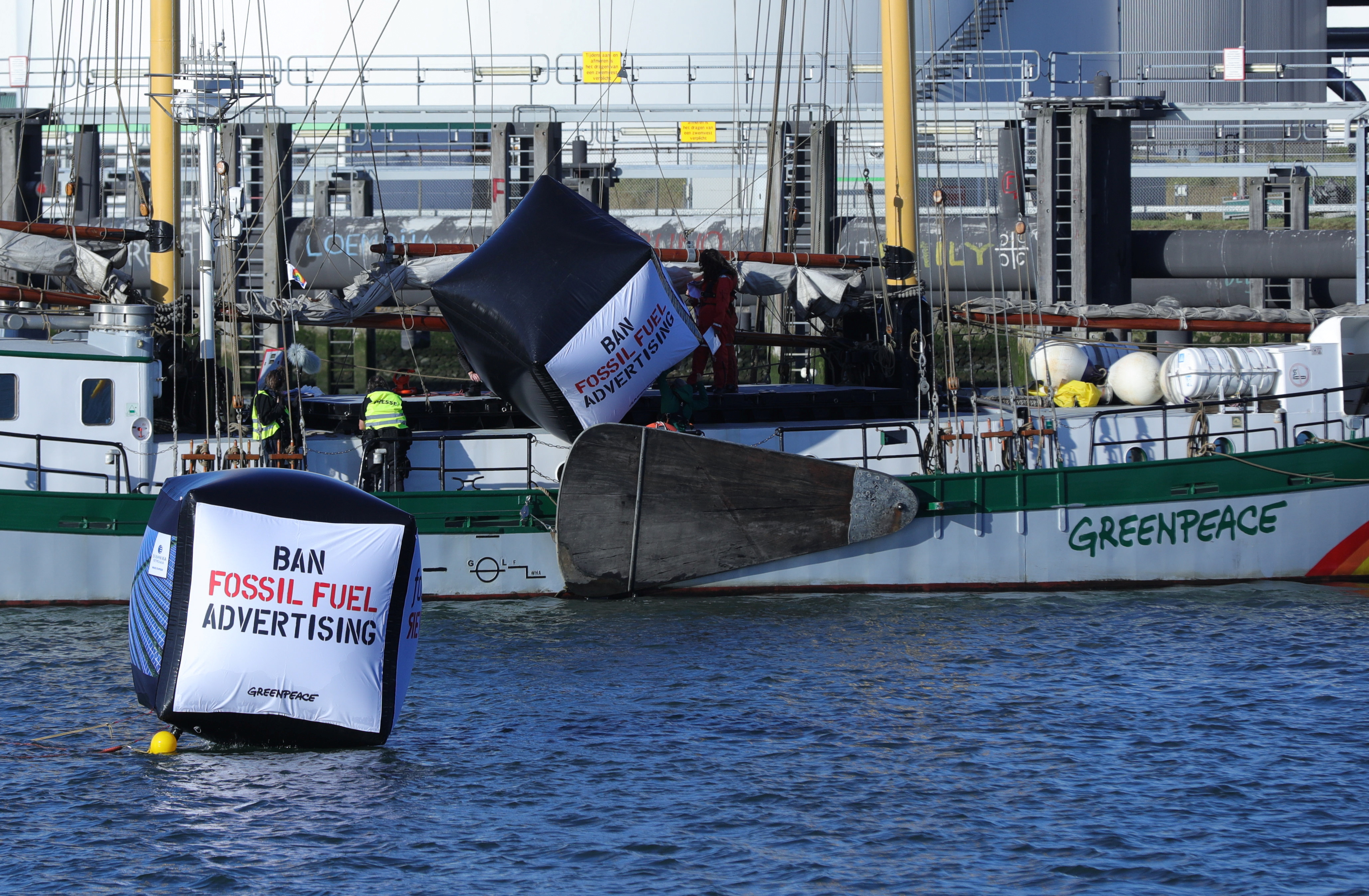 Enviromental activist groups including Greenpeace protest against 