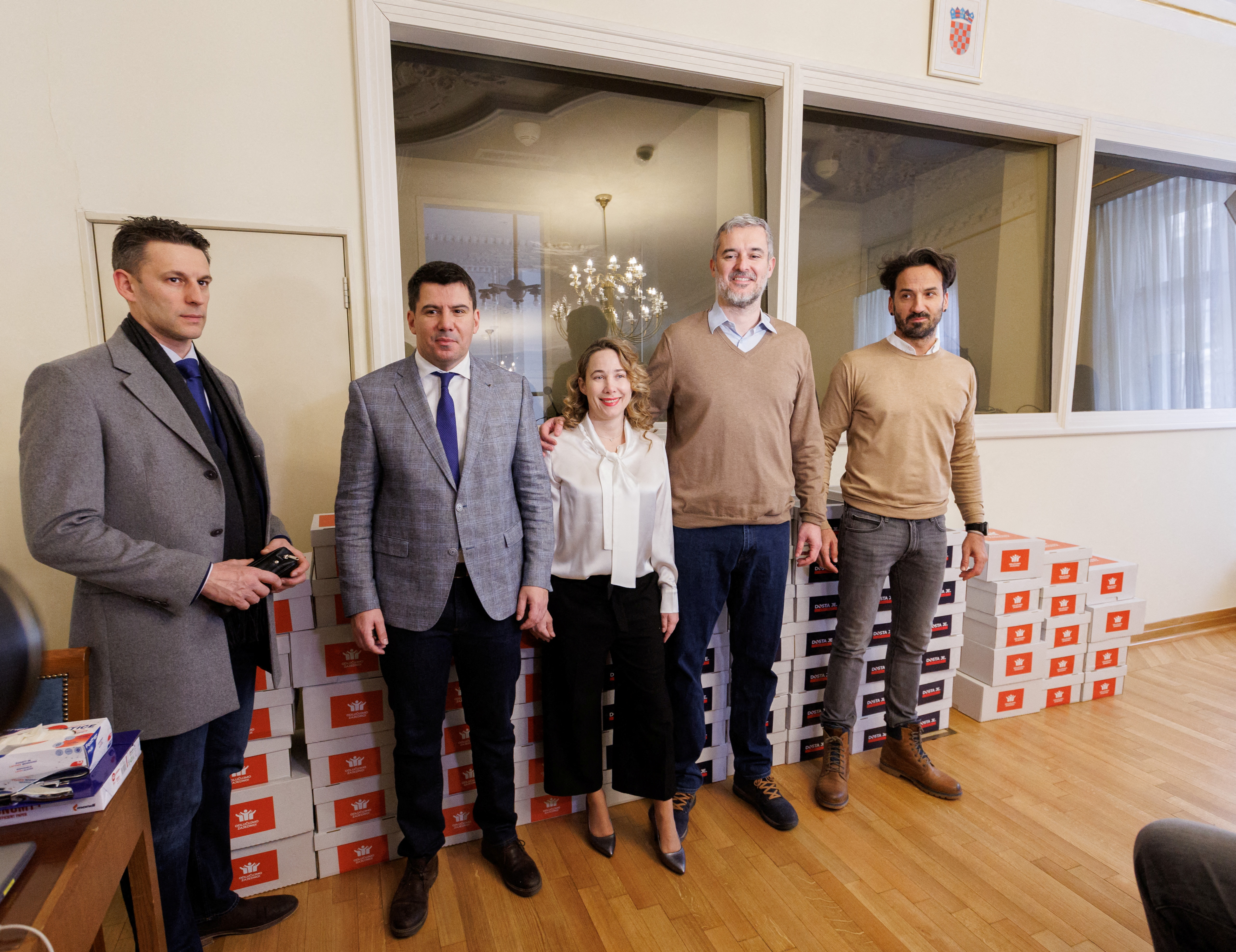 Croatian politicians Bozo Petrov, Nikola Grmoja, Marija Selak Raspudic, Nino Raspudic and Marin Miletic stand next to signatures for the referendum against coronavirus disease (COVID-19) pass in Zagreb