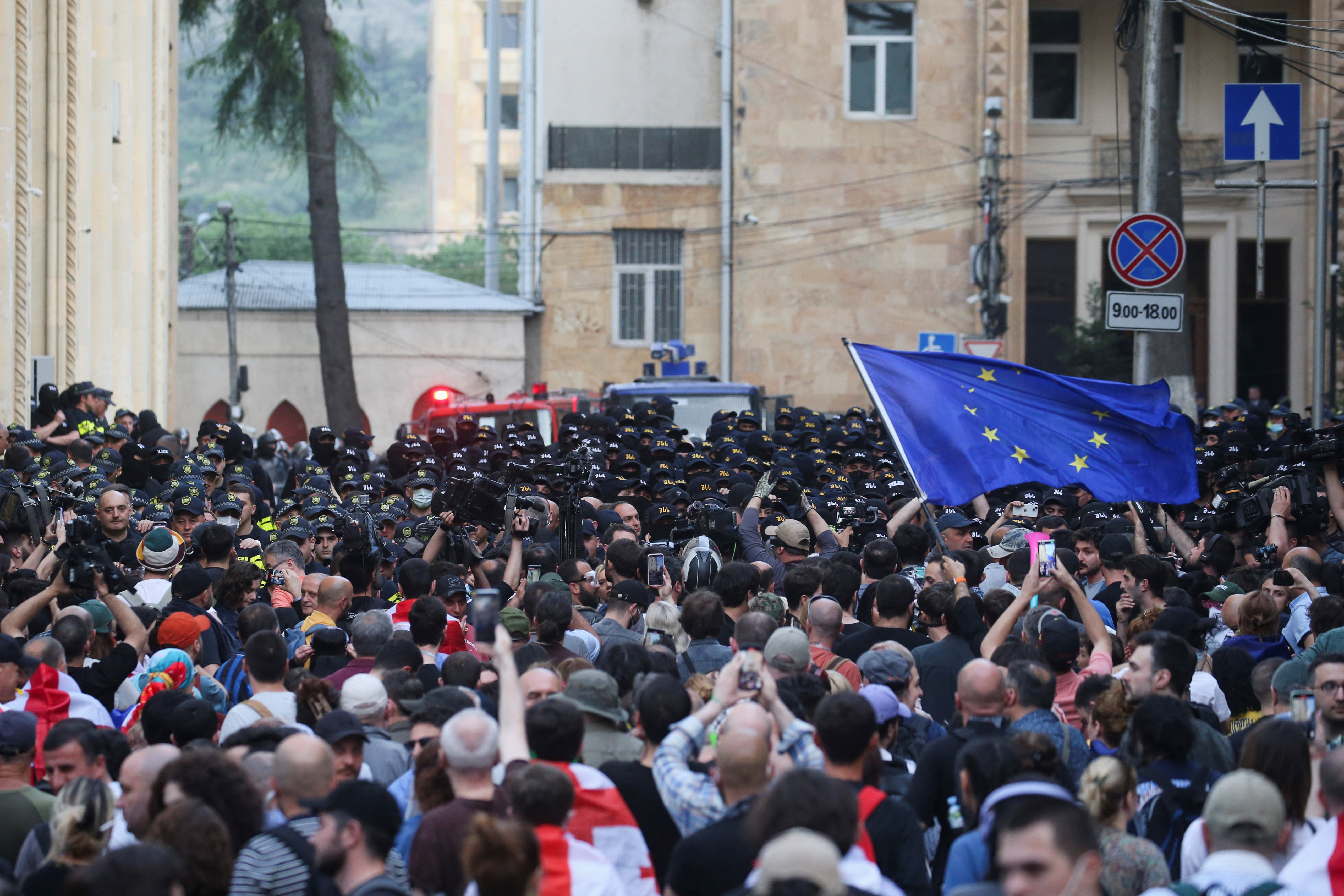 Demonstrators hold a rally to protest against a bill on "foreign agents", in Tbilisi