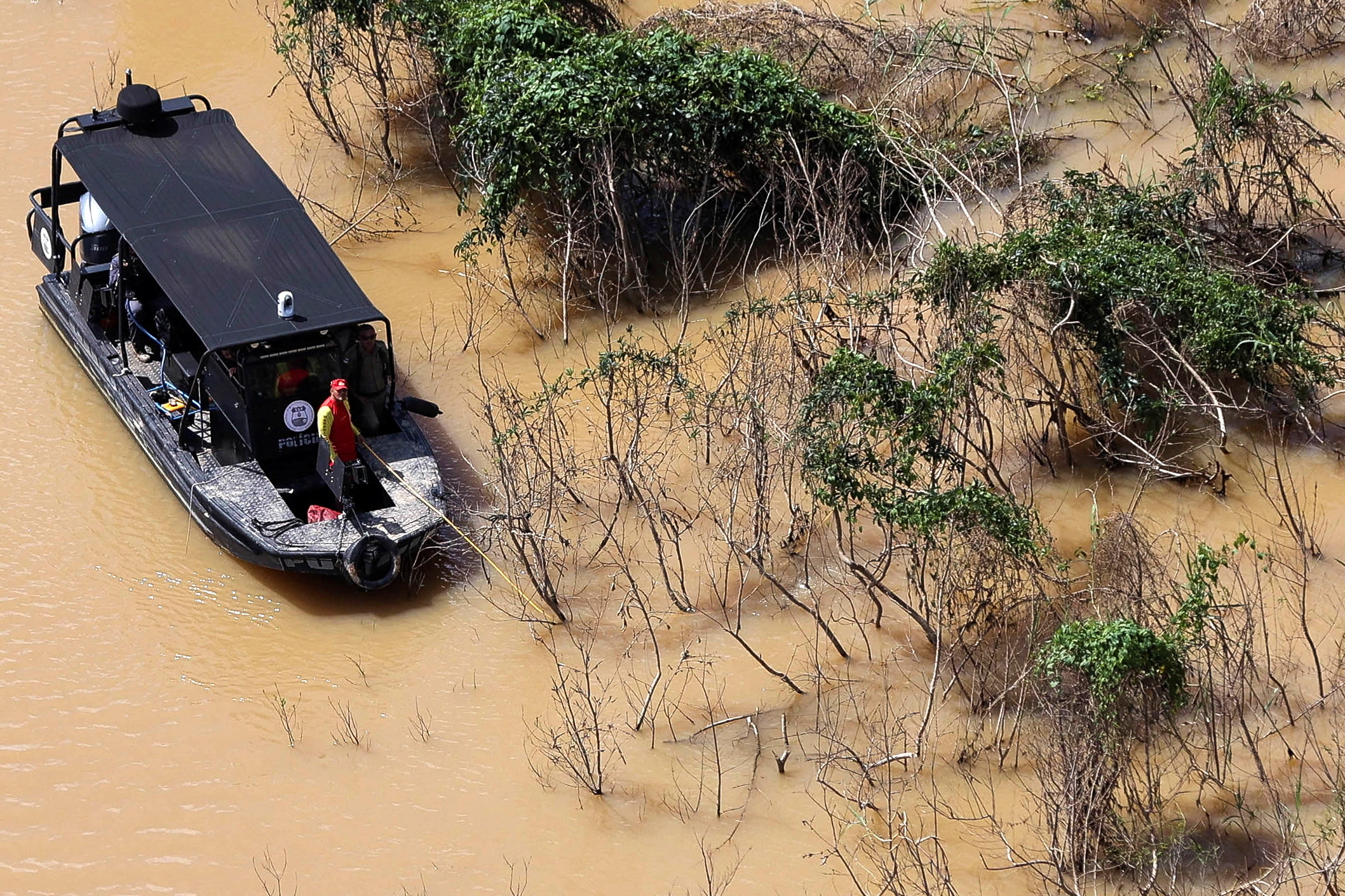 Brazil search teams find possible human remains in river where