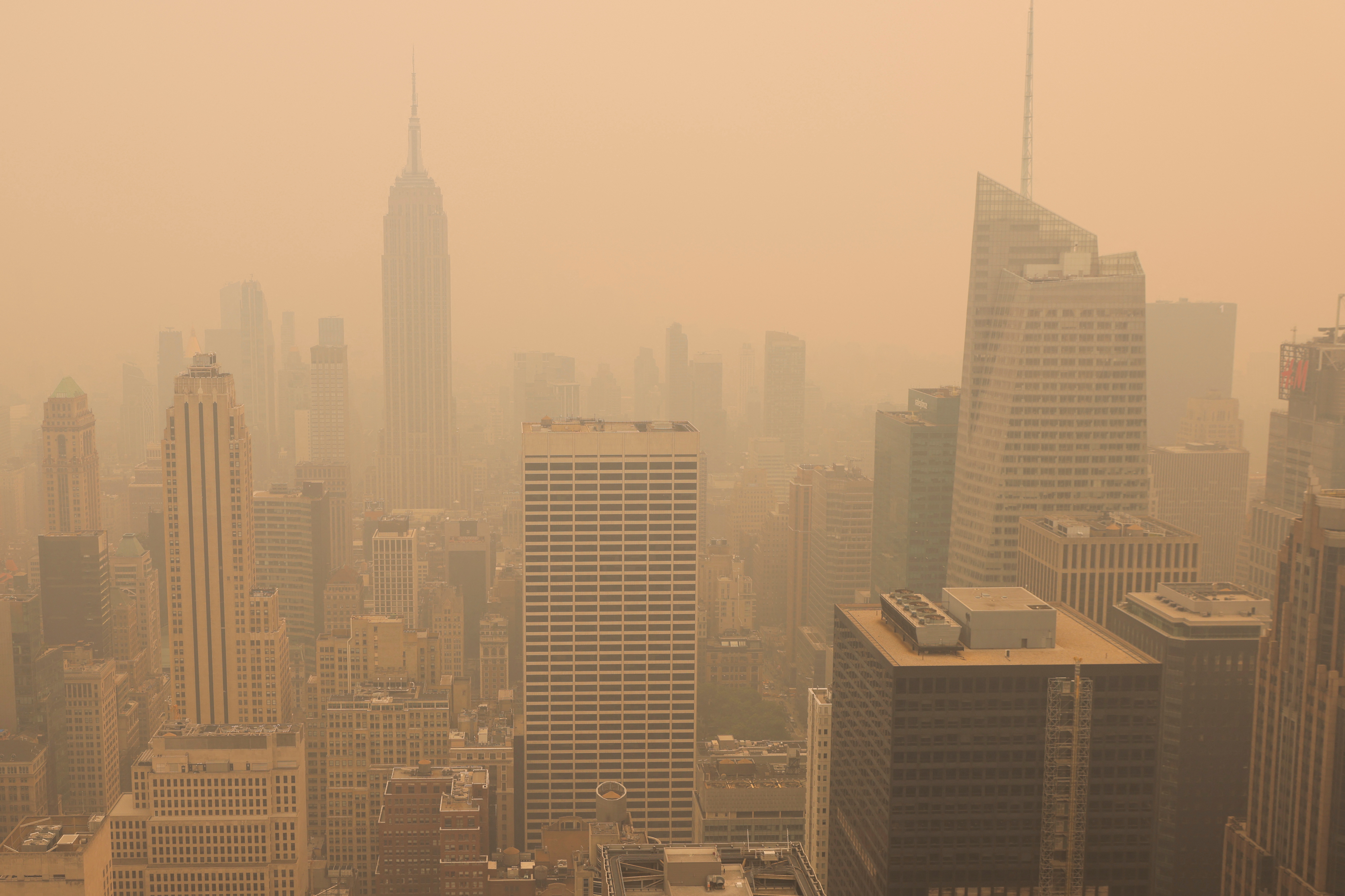 A view from the top of the Rockefeller Center, as haze and smoke caused by wildfires in Canada hang over the Manhattan skyline