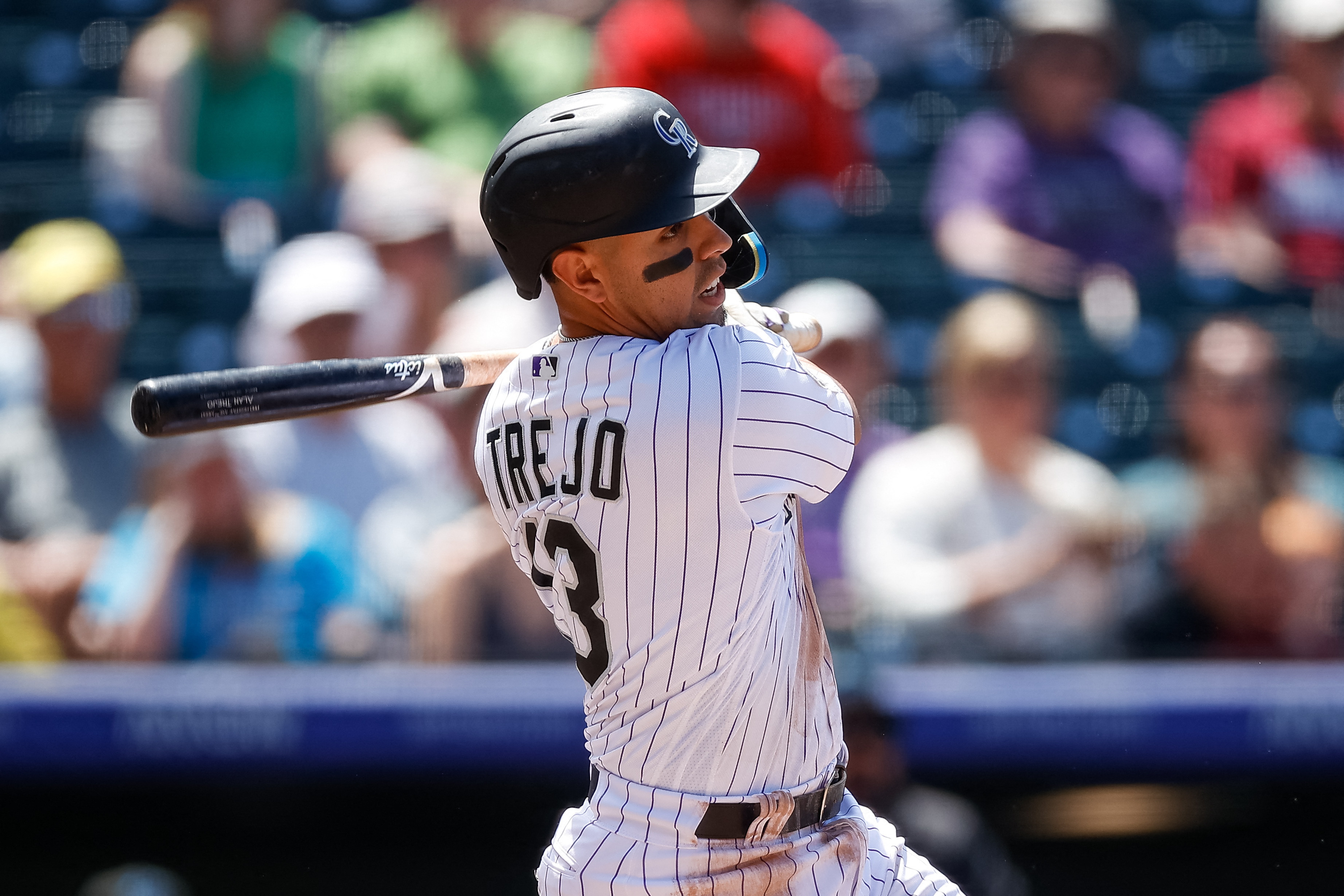 Colorado Rockies outfielder Randal Grichuk reacts after pitching during the  ninth inning of the first baseball game of the team's doubleheader against  the Miami Marlins on Wednesday, June 1, 2022, in Denver.