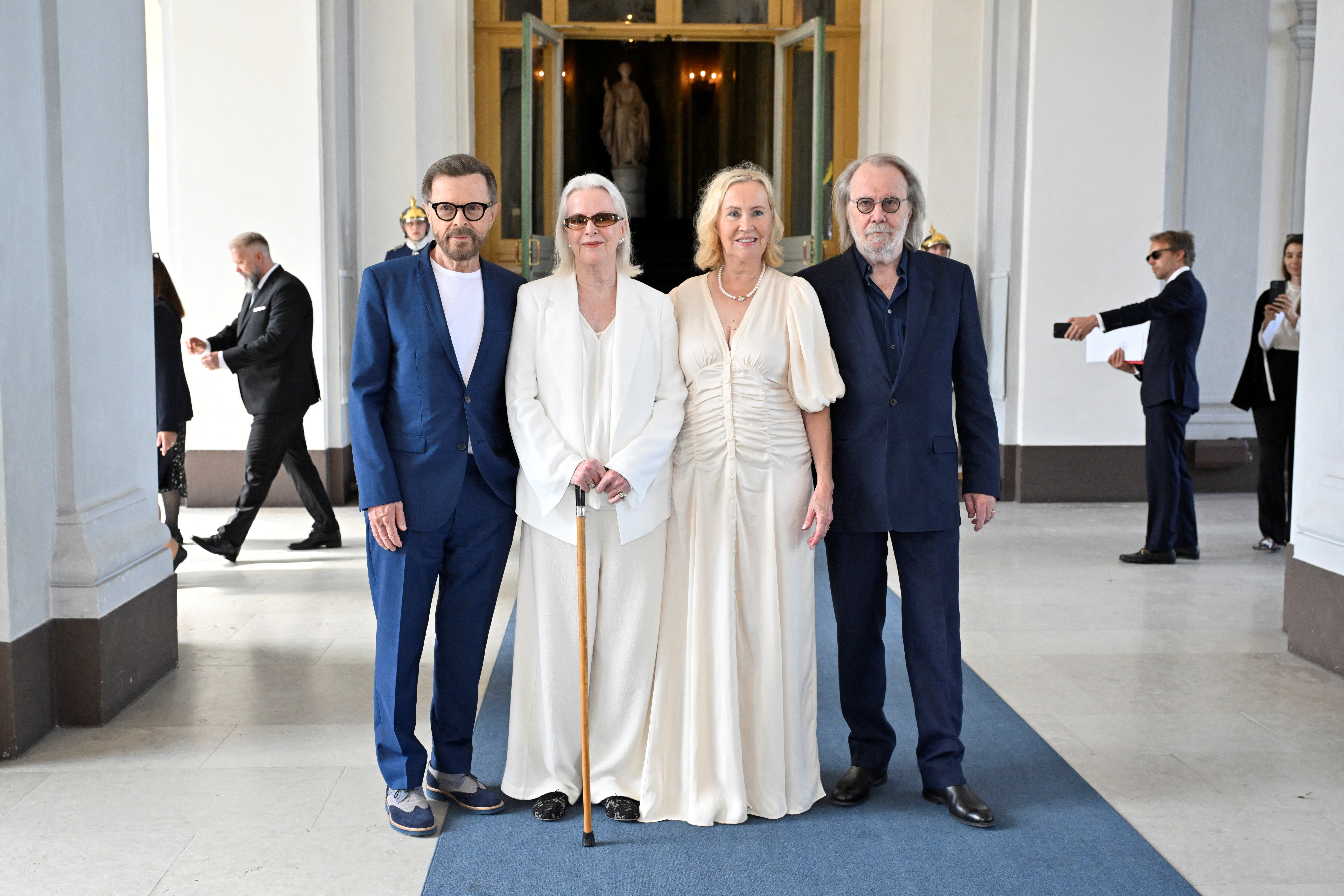 The members of the music group ABBA receive the Royal Vasa Order from Sweden's King Carl Gustaf and Queen Silvia in Stockholm