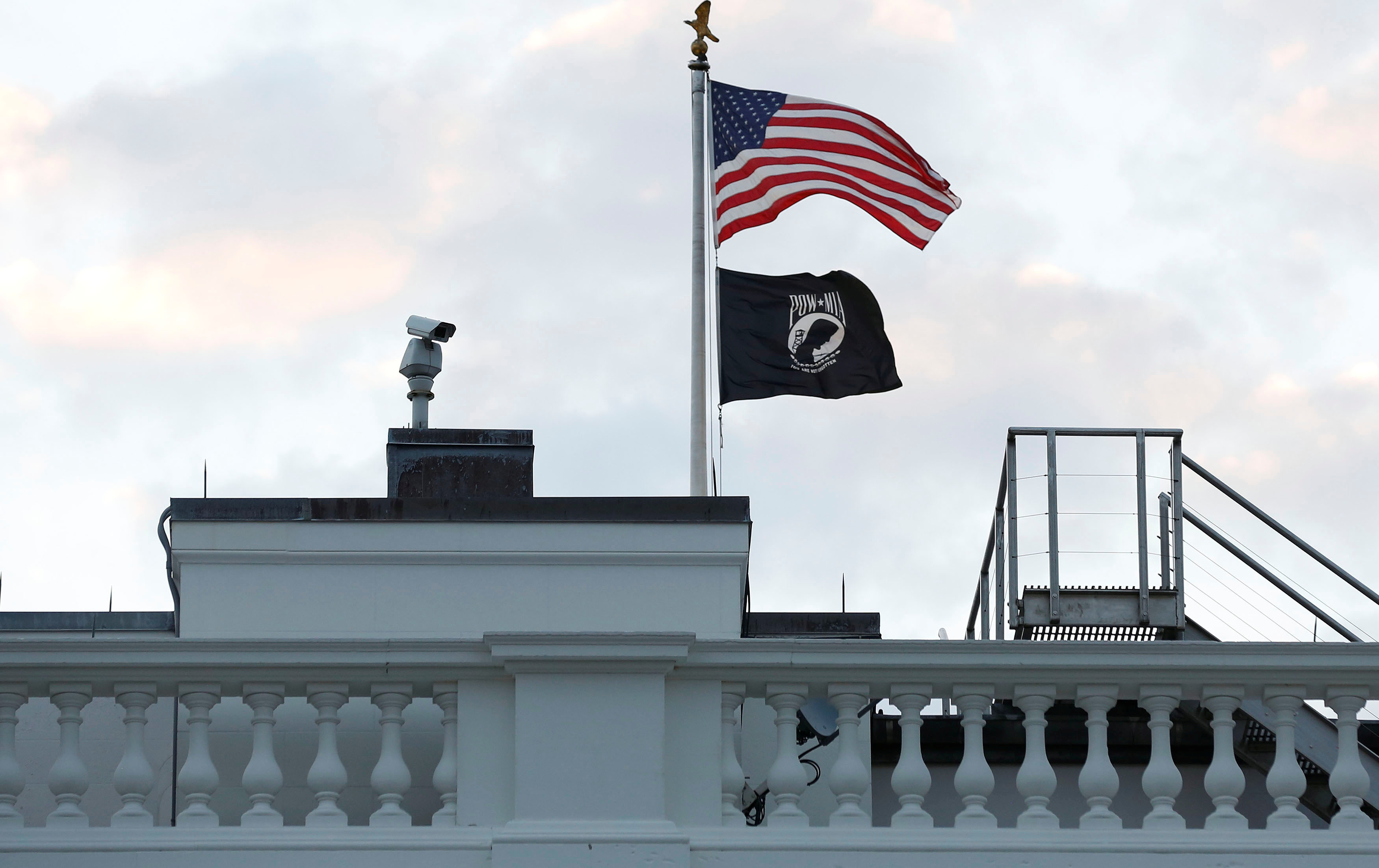 What is this black and white flag flying outside the post office?