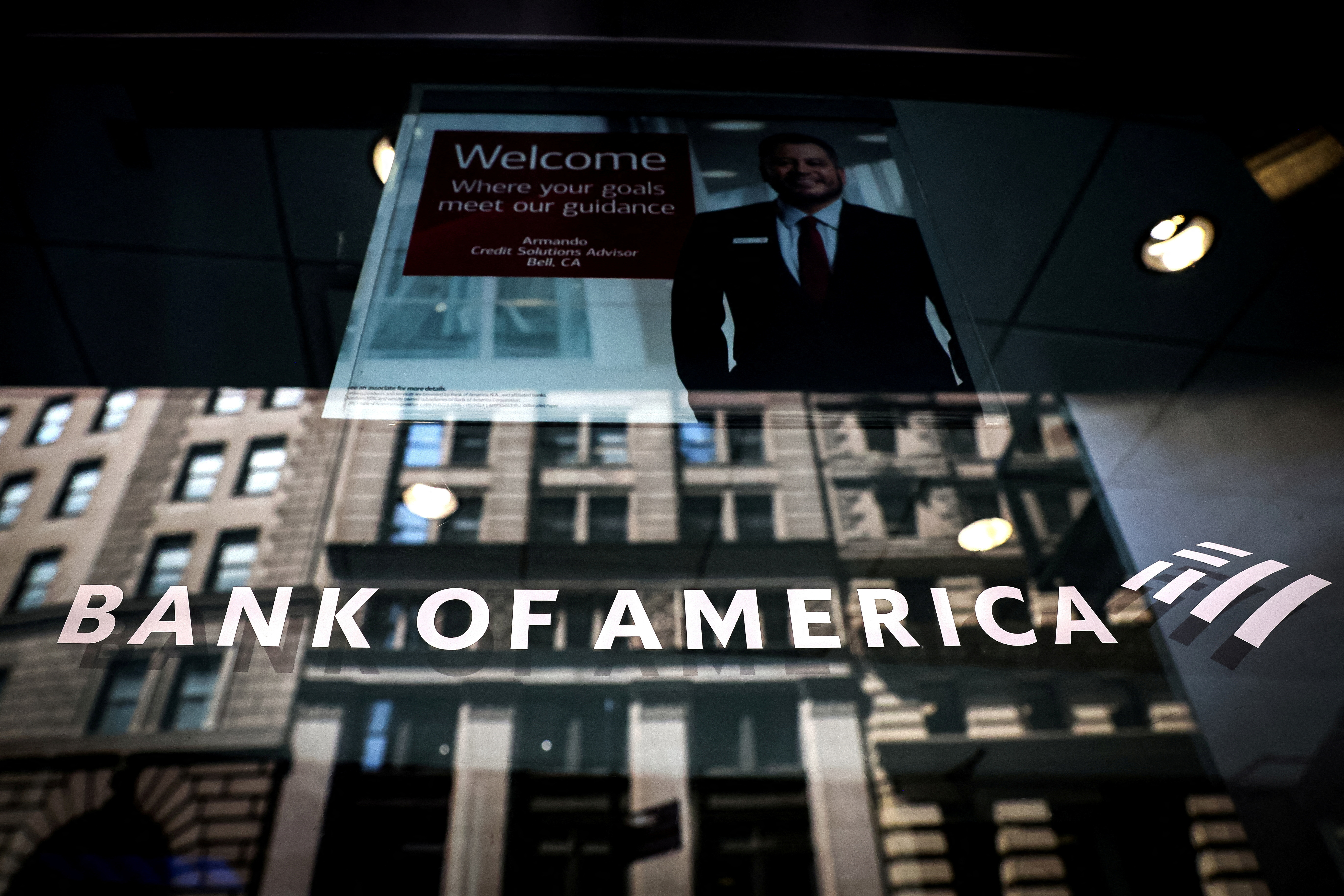 Bank of America logo is seen on the entrance to a Bank of America financial center in New York