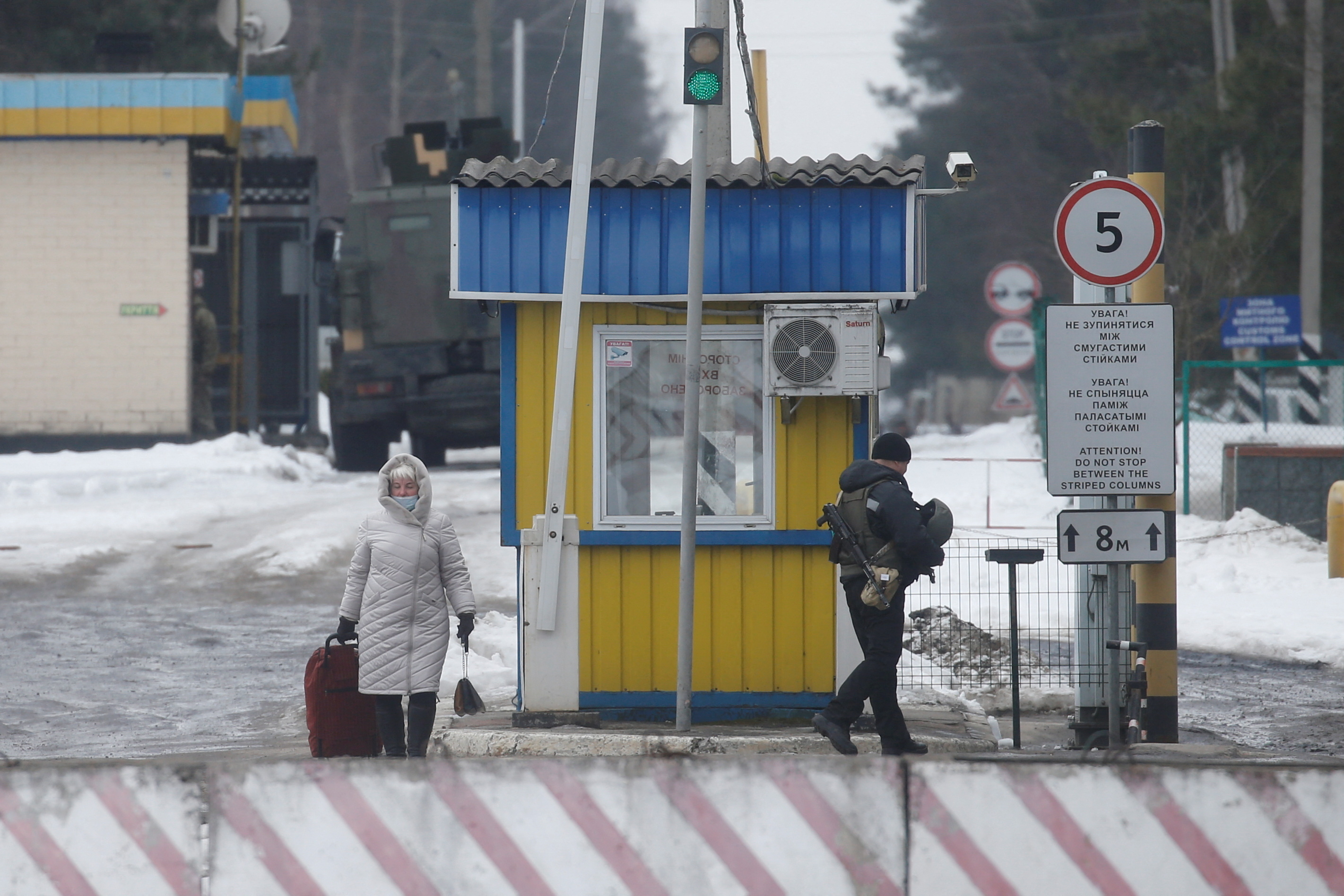 Ukrainian border guards keep watch on the border with Belarus and Russia in Chernihiv region