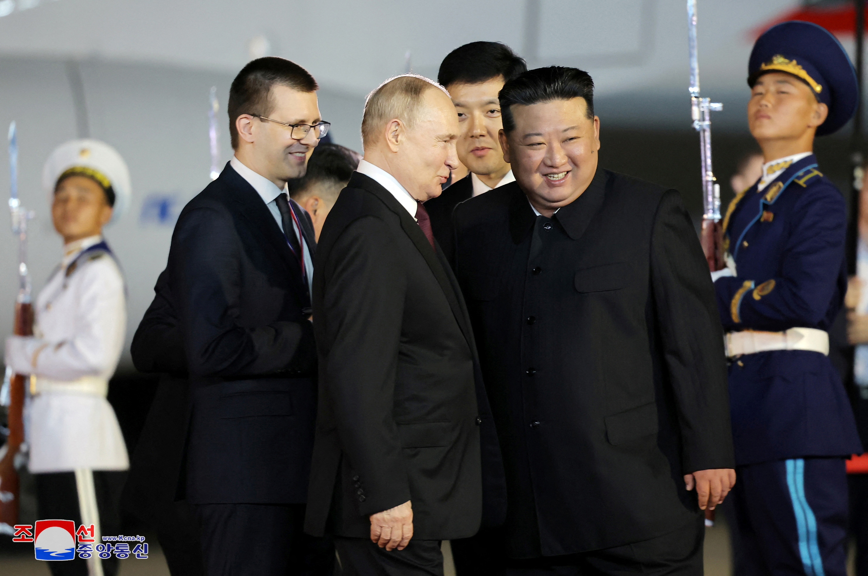 Russian President Vladimir Putin is welcomed by North Korean leader Kim Jong Un upon his arrival at an airport in Pyongyang