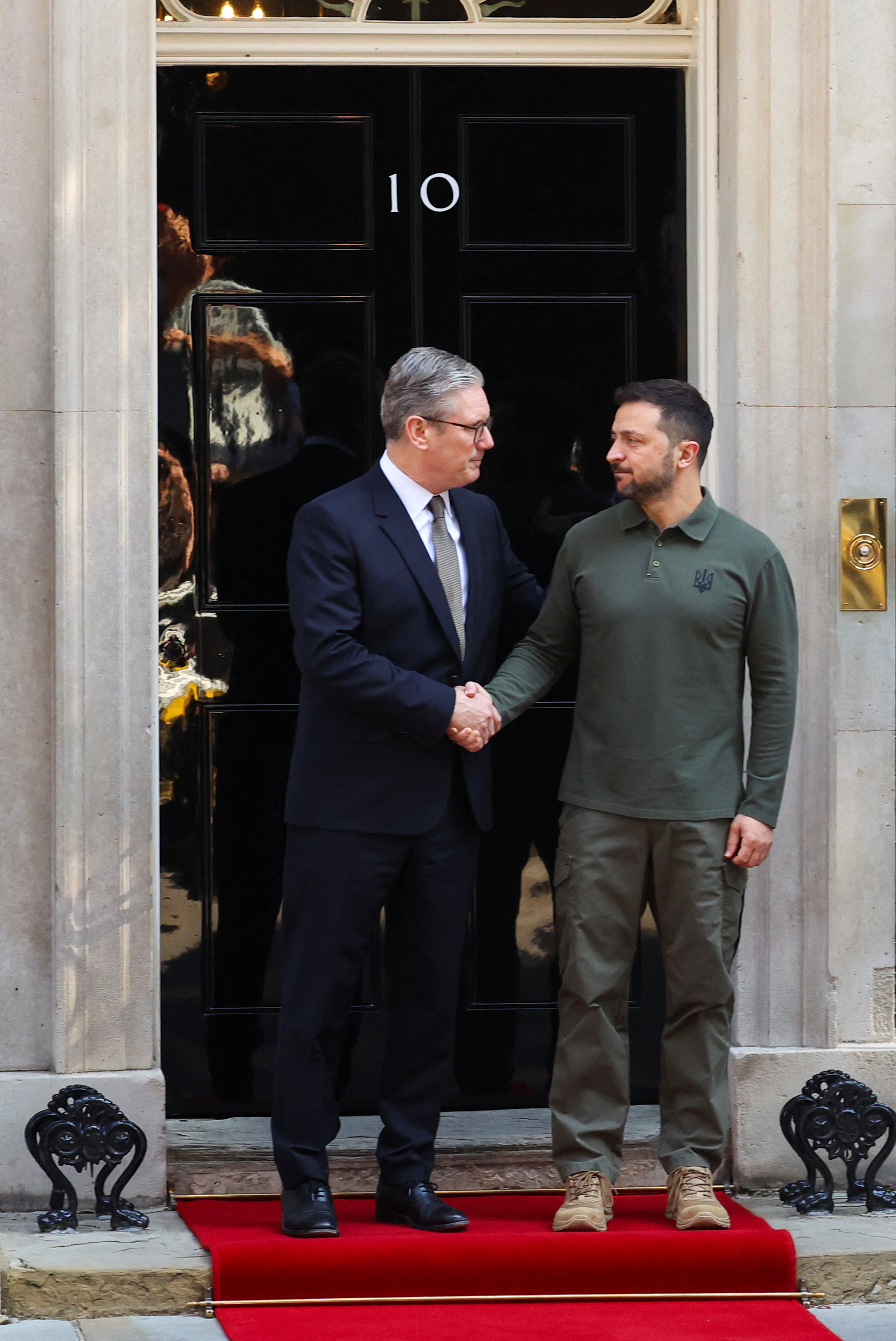 Zelenskiy arrives in Downing Street to meet UK government cabinet | Reuters