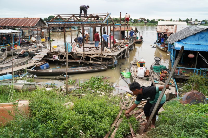 Cambodia begins evicting floating homes amid protests | Reuters