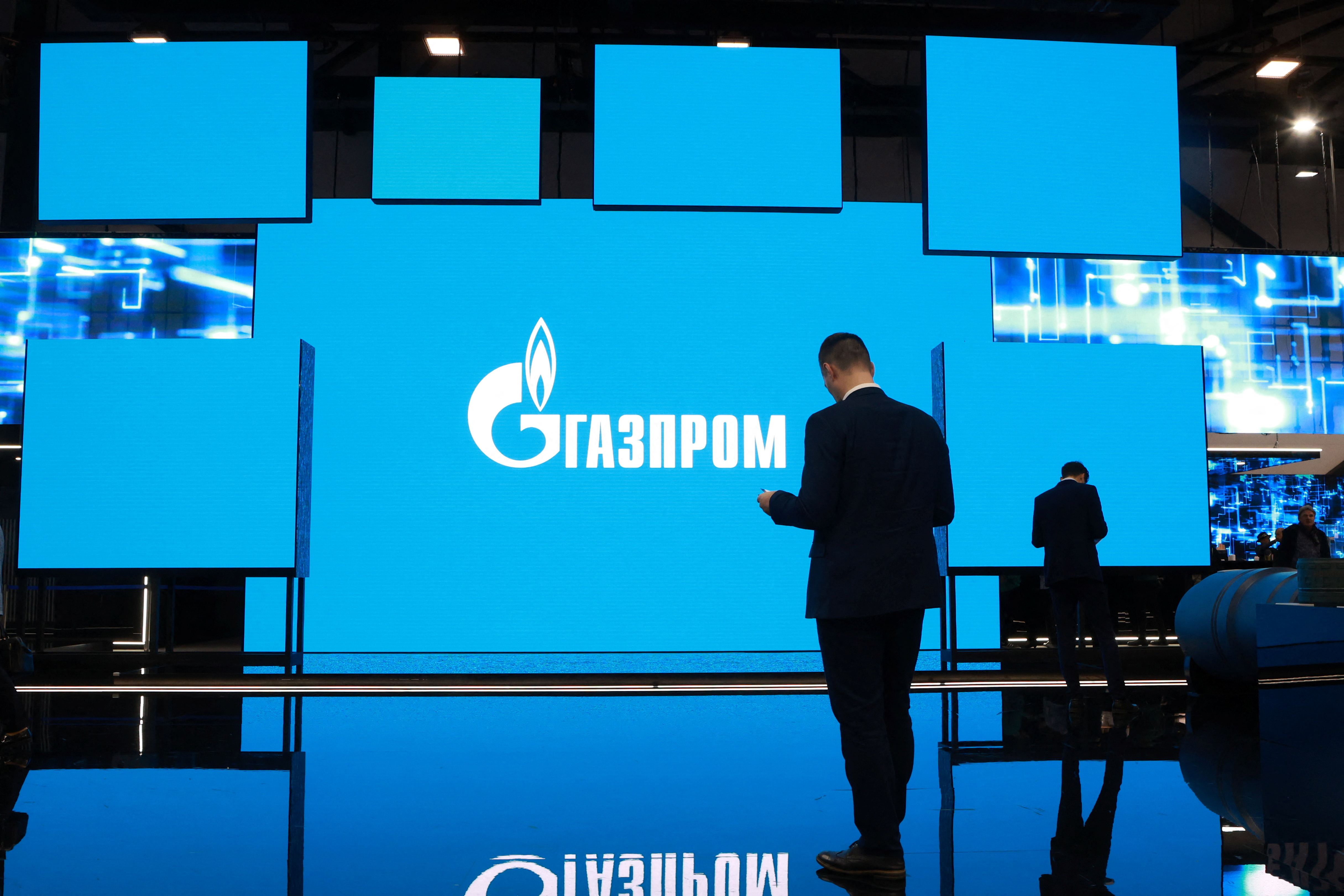 The logo of Gazprom is displayed on a screen during the Saint Petersburg international gas forum in Saint Petersburg