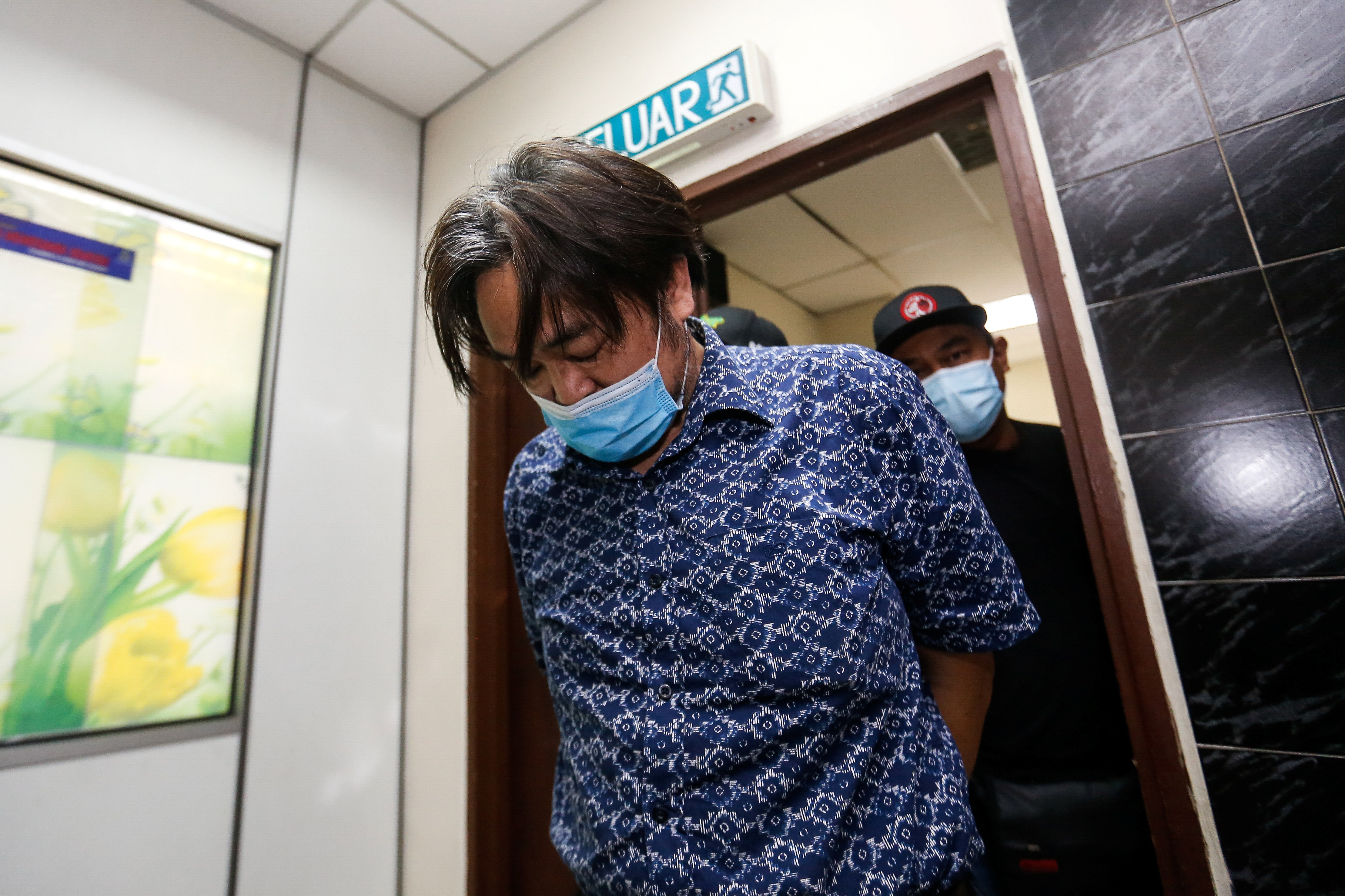 Deaf South Korean pastor charged in Malaysia with sexual assault Reuters pic