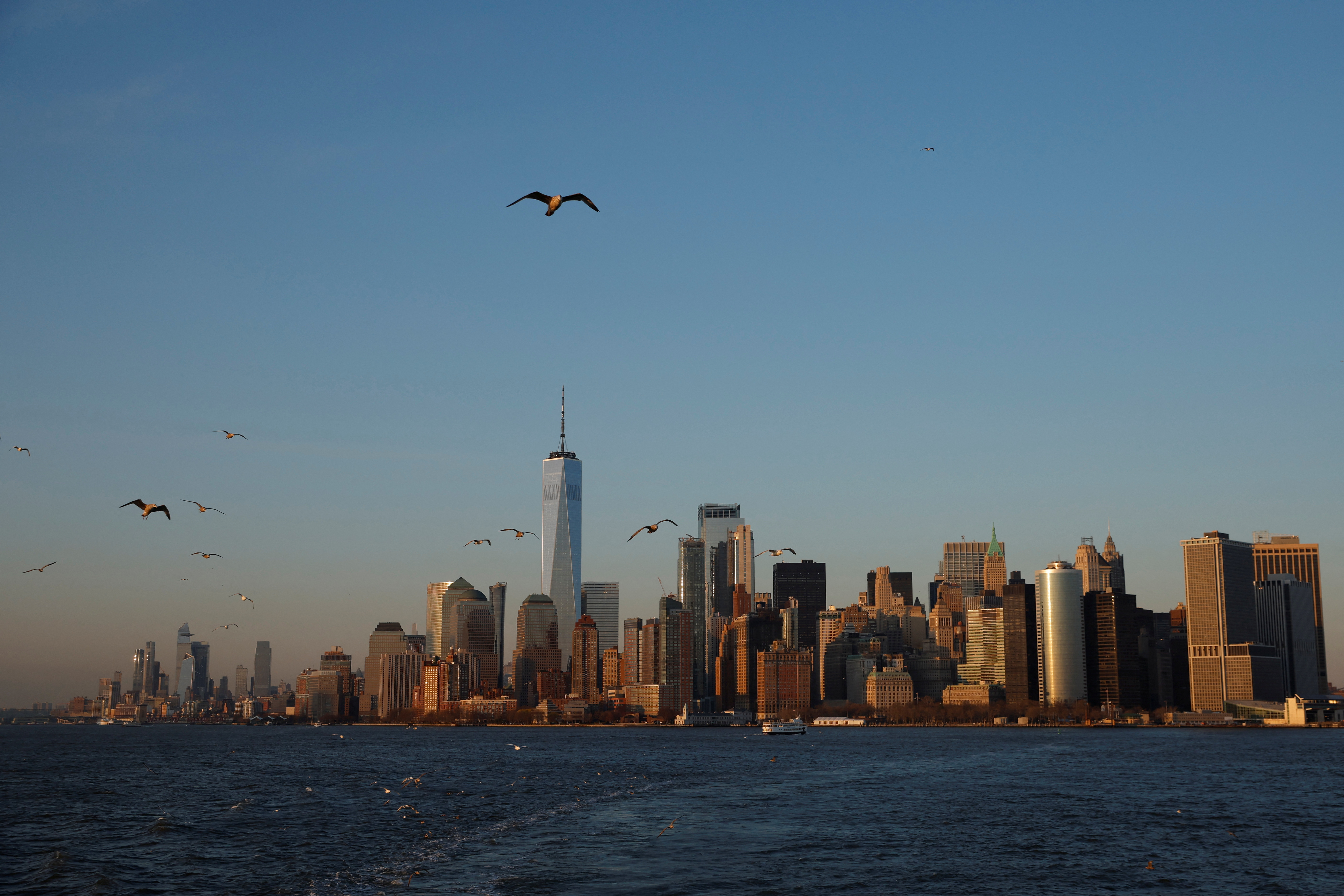 Manhattan skyline is seen during sunset in New York City